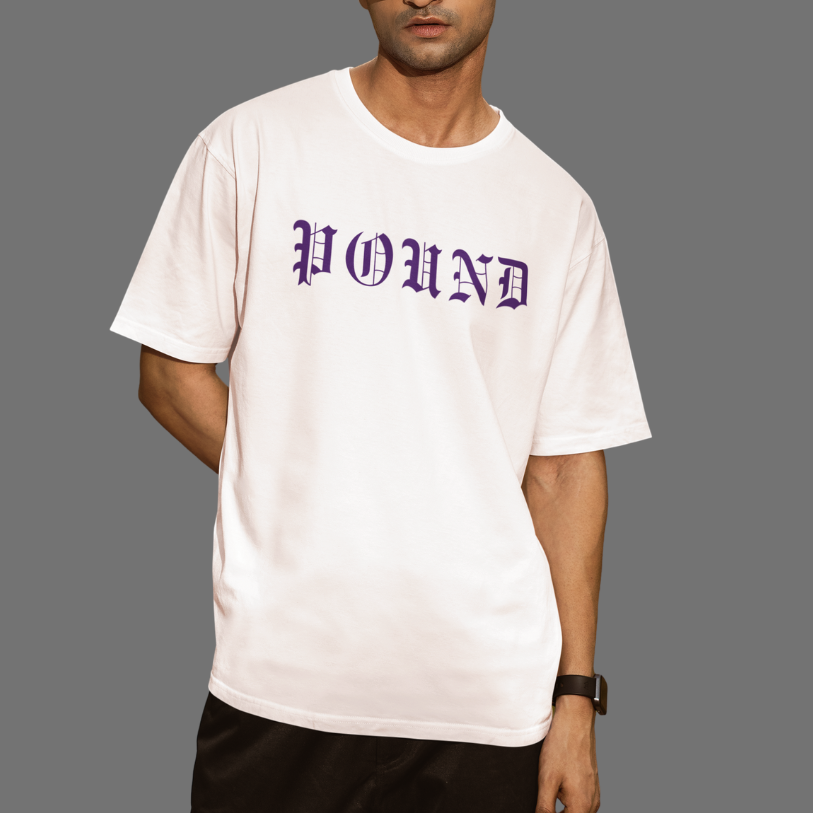 A person with dreadlocks wearing a blue sports jersey with the word 'POUND' printed on it, and a black jacket draped over their shoulders.