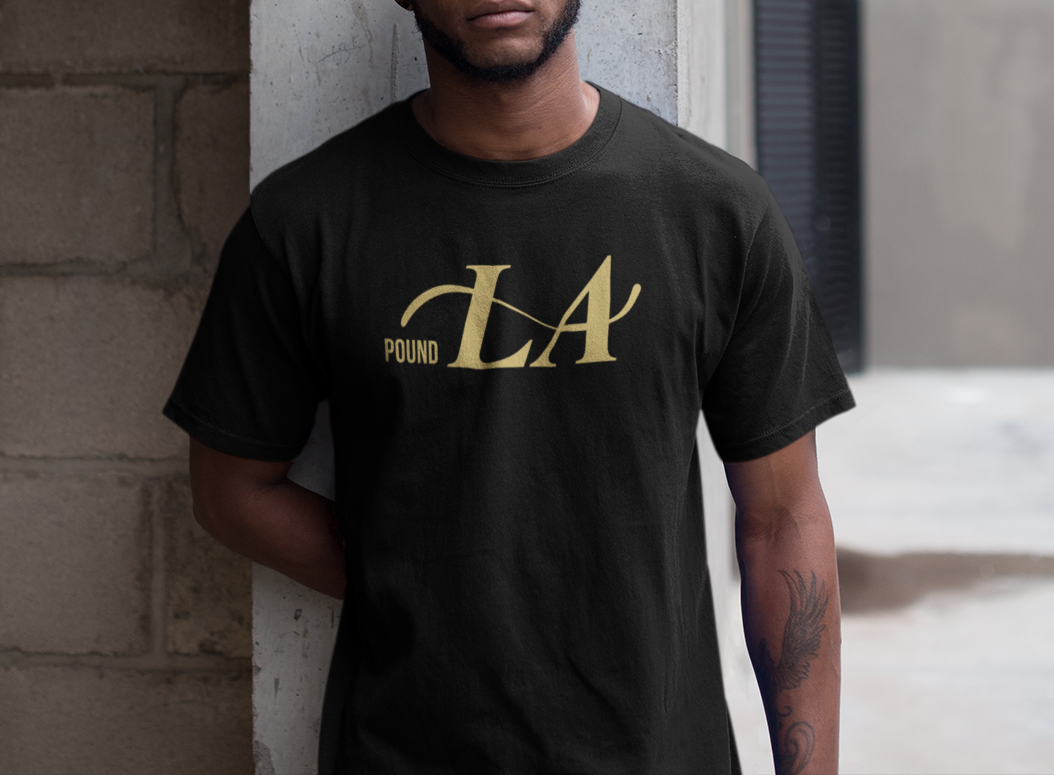 mockup-of-a-man-wearing-a-t-shirt-while-at-a-warehouse-entrance-a16900.png
