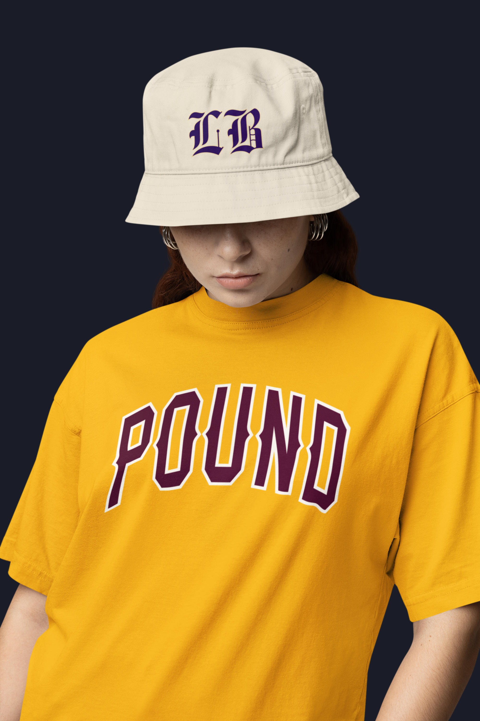 oversized-t-shirt-mockup-of-a-serious-woman-posing-in-a-studio-with-a-sublimated-bucket-hat-m38934 (1).png