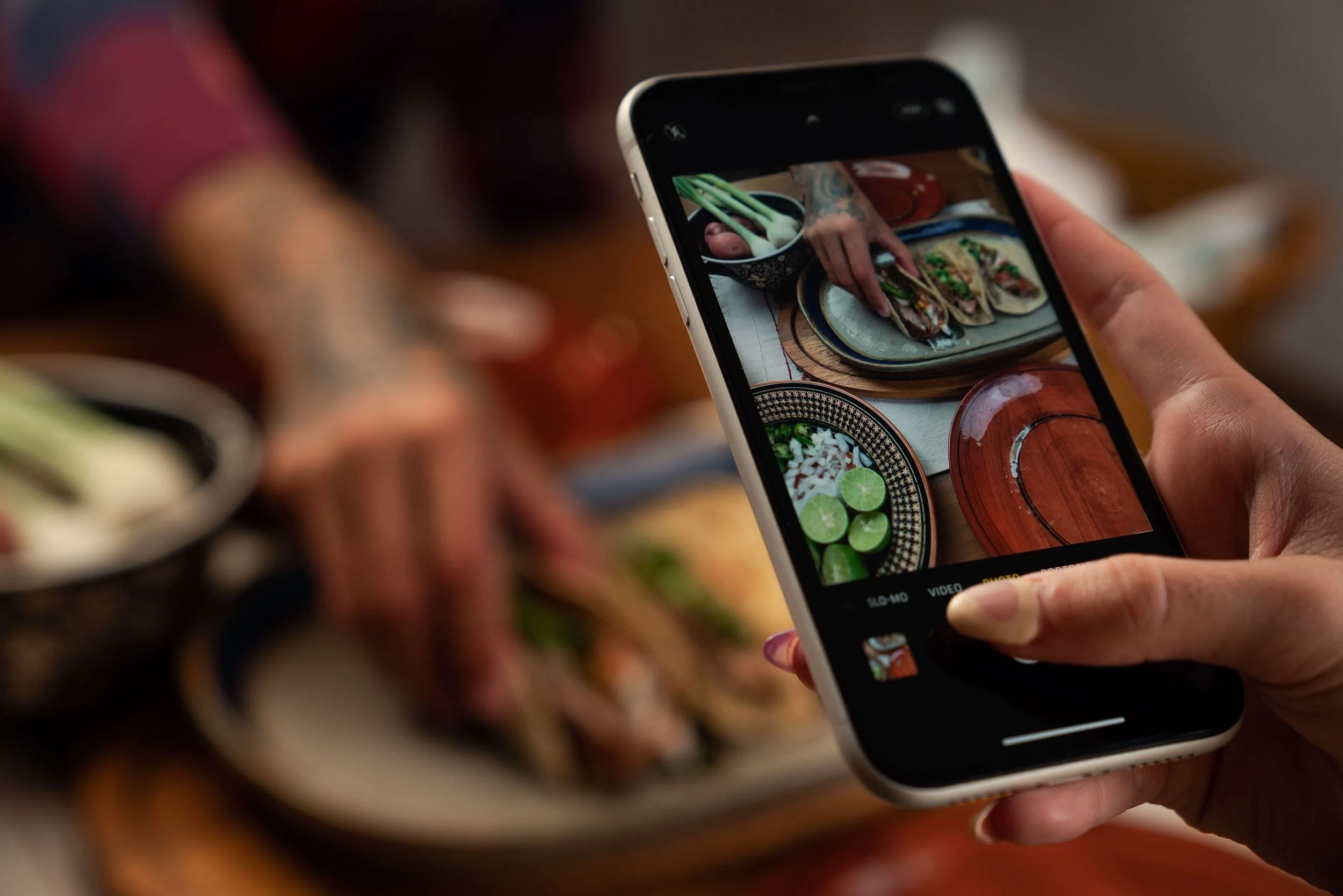 Chef photographing food for restaurant branding — why great photos alone don't build a consistent brand identity