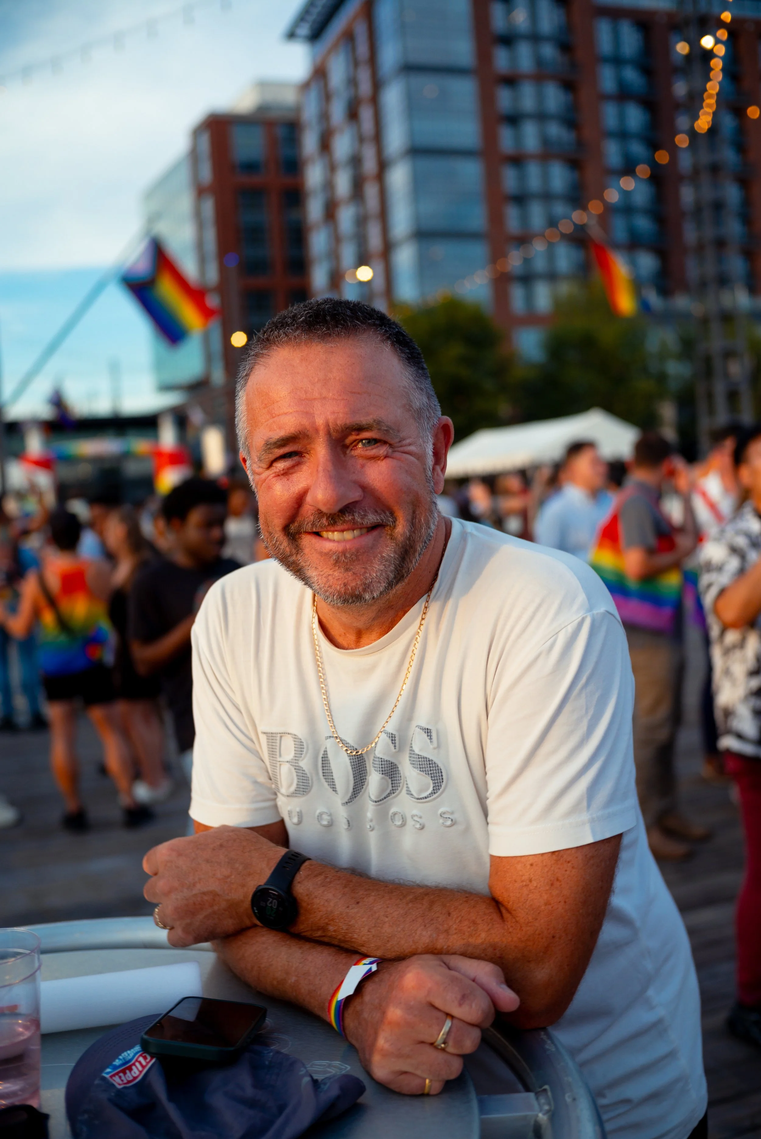 Mark, an Australian tourist visiting Washington, D.C., attends Pride on the Pier. The event brought together local residents and visitors for an evening of performances, music and celebration along the waterfront.