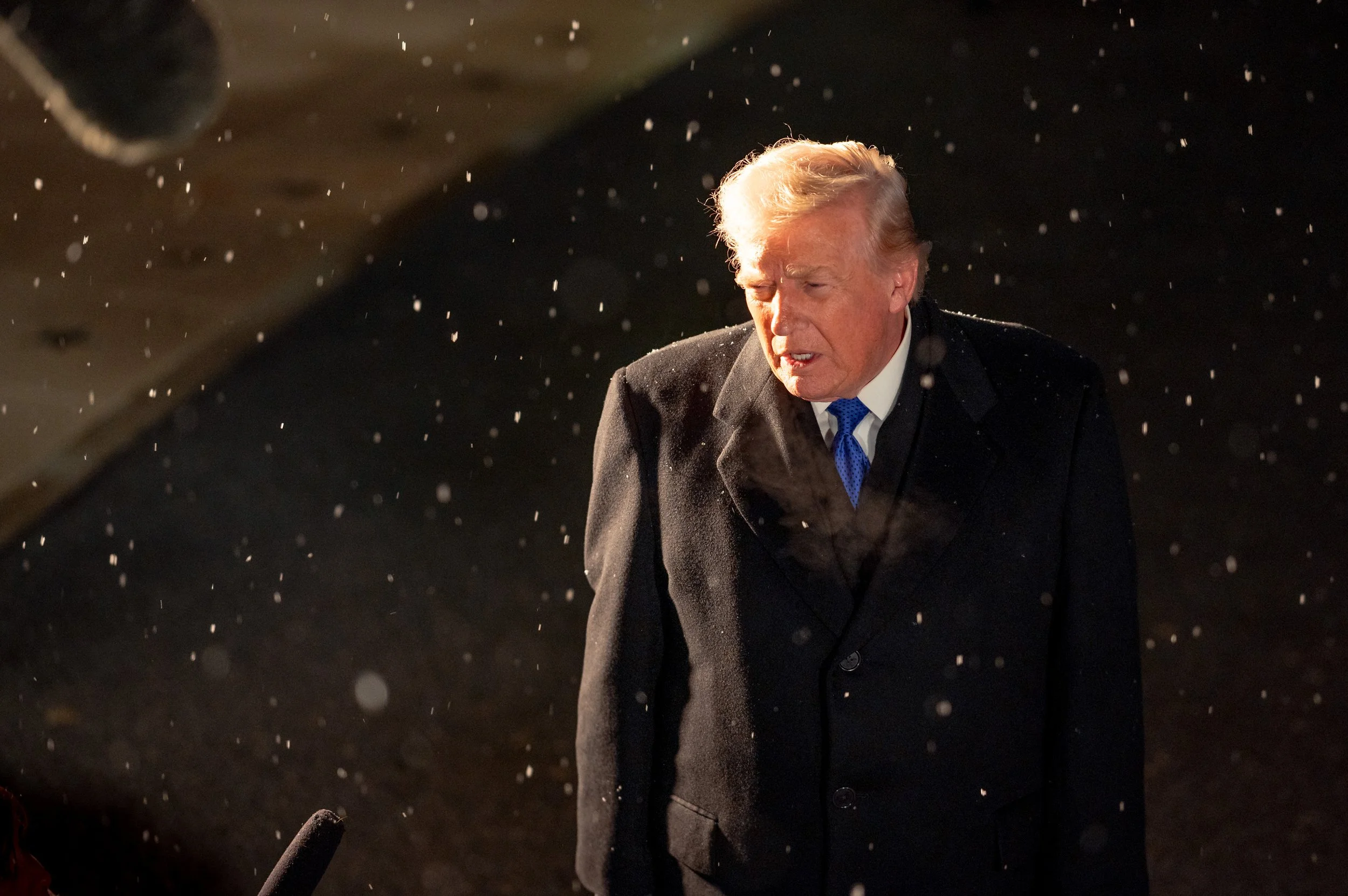 President Donald Trump speaks to reporters in the snow on the South Lawn. February 6, 2026.