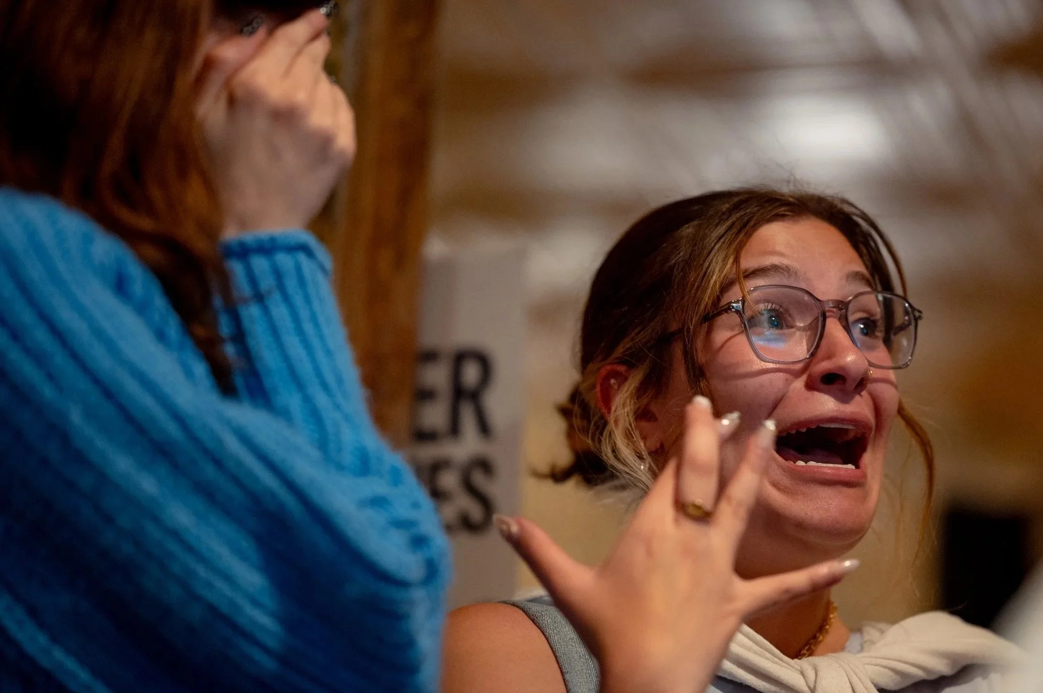 At a Democratic watch party at The Golden Pony, a woman cheers as supporters celebrate Abigail Spanberger’s historic victory, making her the first female governor of Virginia after Tuesday’s election. Spanberger’s win marked a milestone in the common