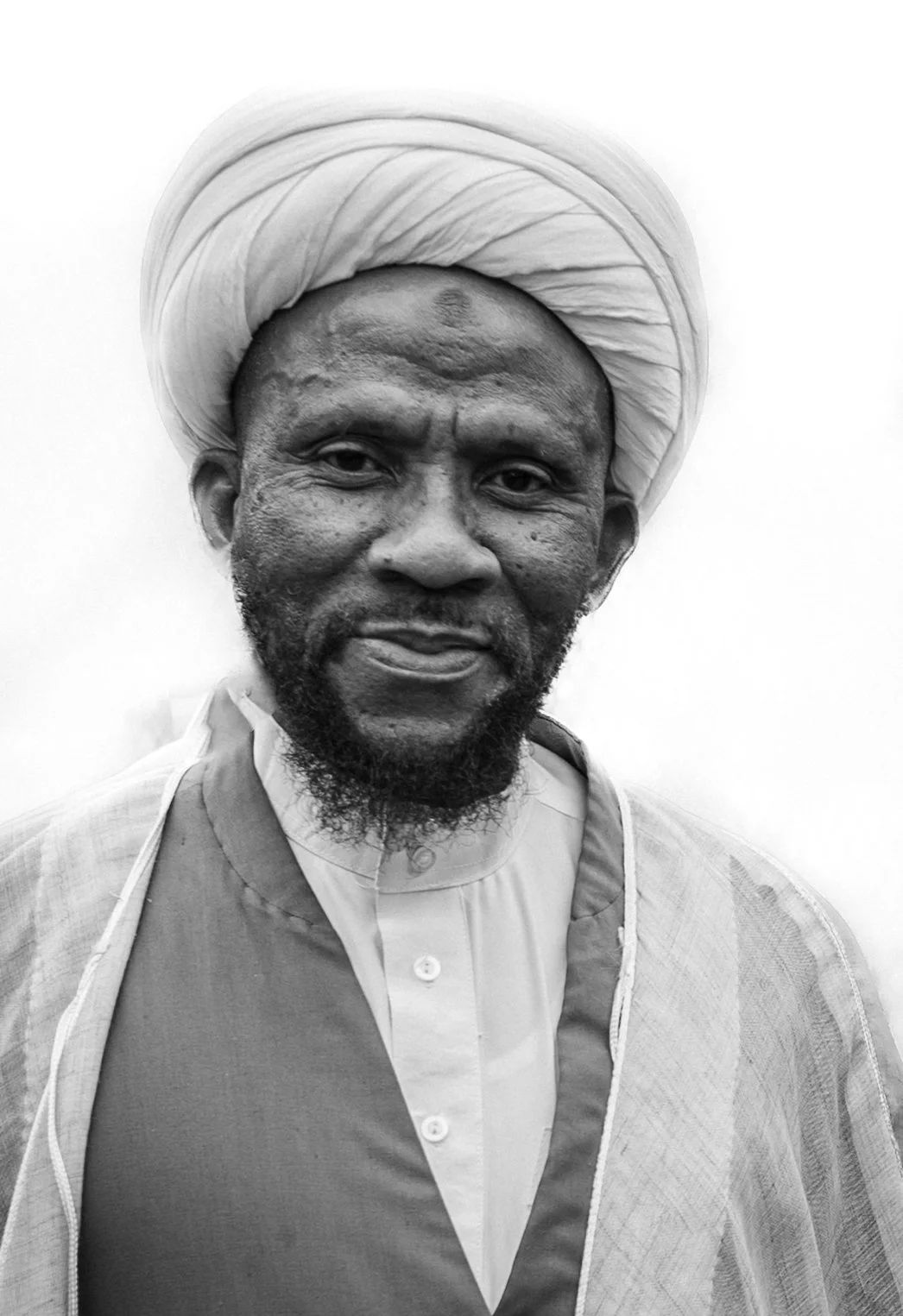 An Iman leads a prayer for the people of Iran outside of the White House. 