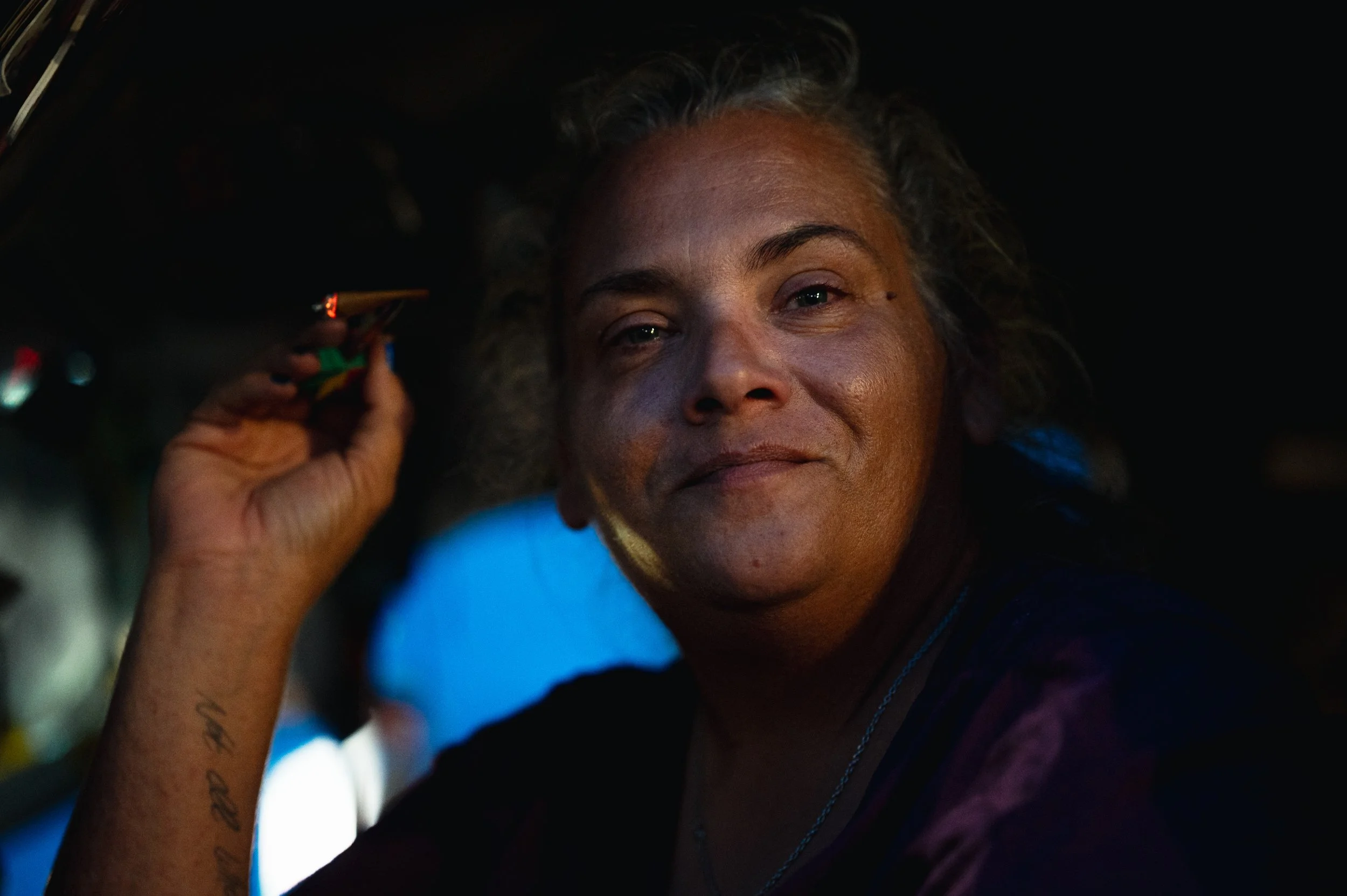 Heather sits inside her car in Harrisonburg, Va., while taking a break from the day's challenges. The vehicle functioned as both transportation and shelter during more than three years of housing instability.