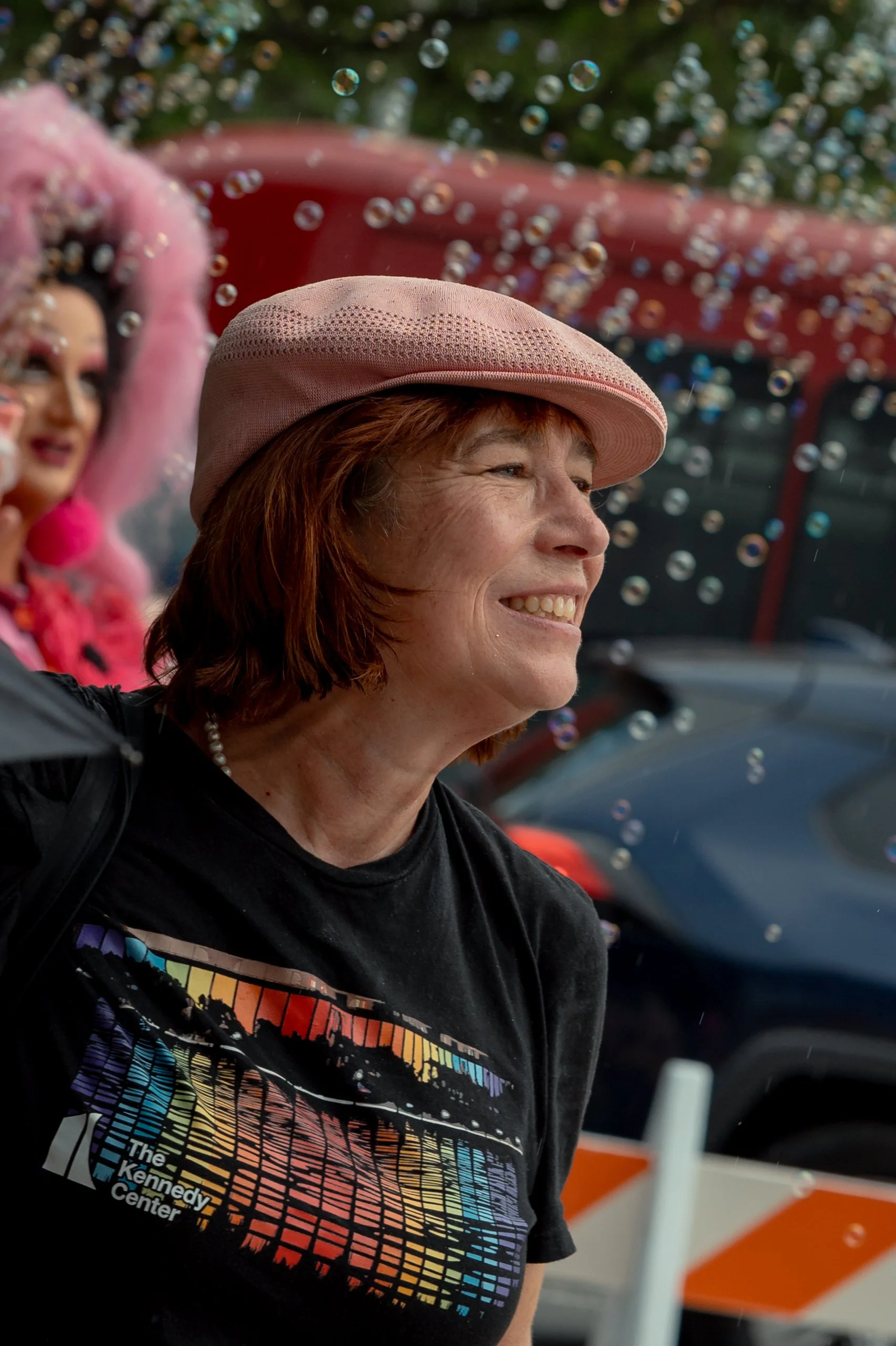 Jane watches as workers erect scaffolding outside the John F. Kennedy Center for the Performing Arts in Washington, D.C. For many residents, the activity at the Kennedy Center represented more than routine construction work. “It feels like the first 