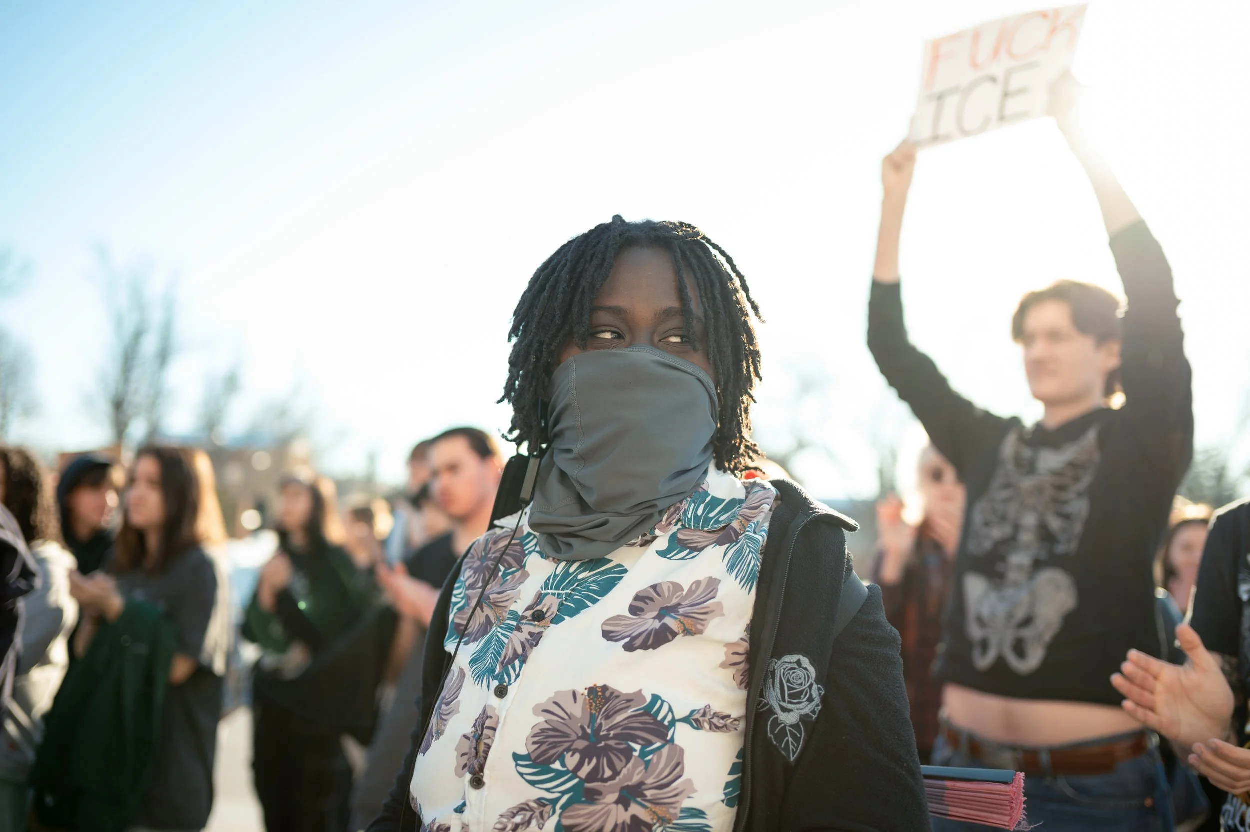 A protestor at an anti ICE event held at City Hall in Harrisonburg VA bangs on her water bottle and chants. February 10, 2026.