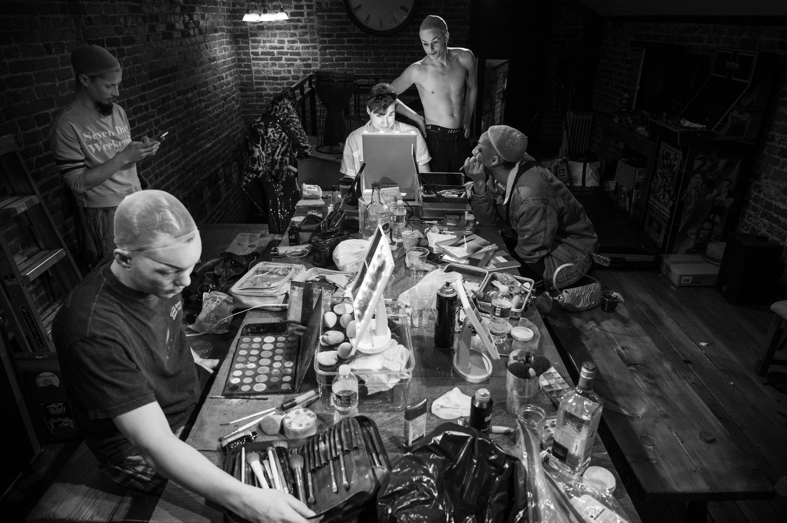 Drag Queens take shots, get dressed, and prepare for their show. 