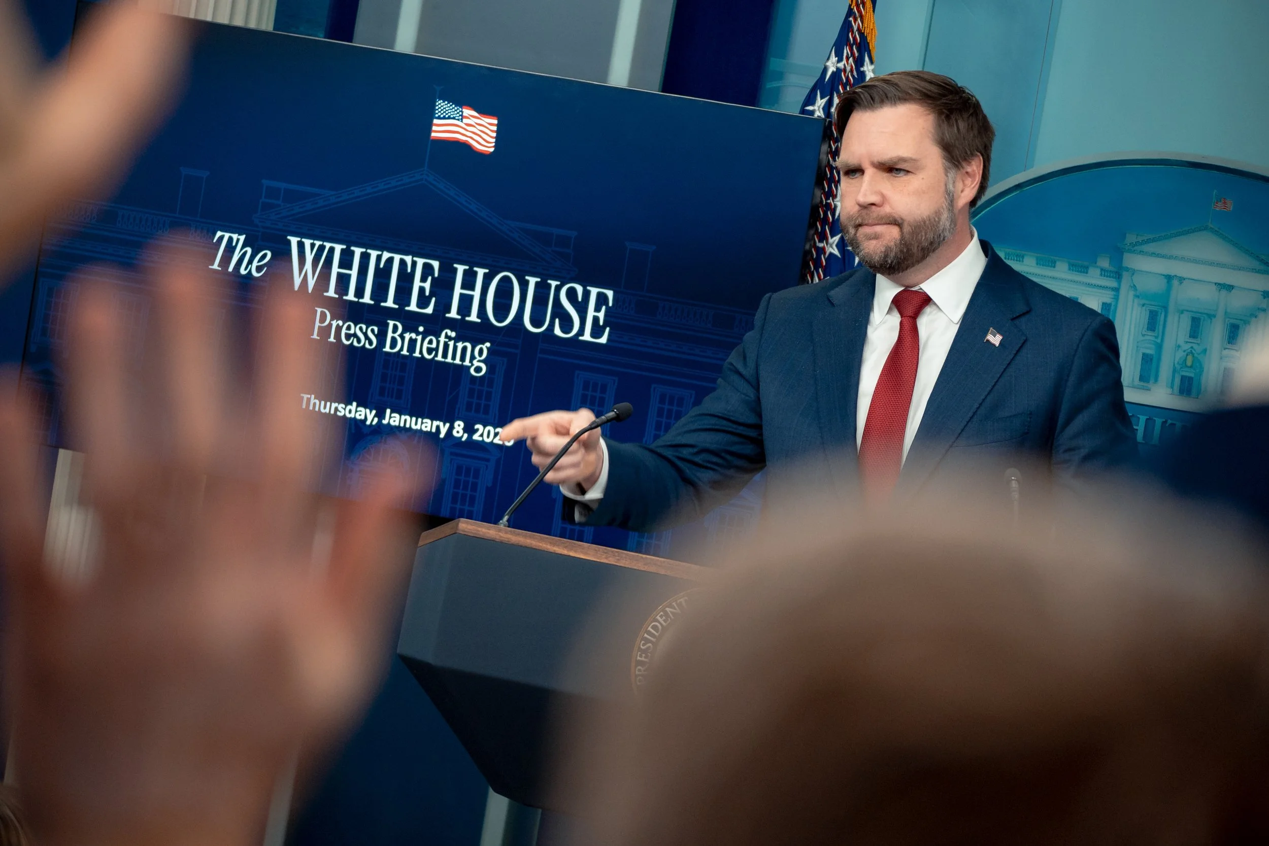 Vance answers reporters questions in the Press Briefing Room.