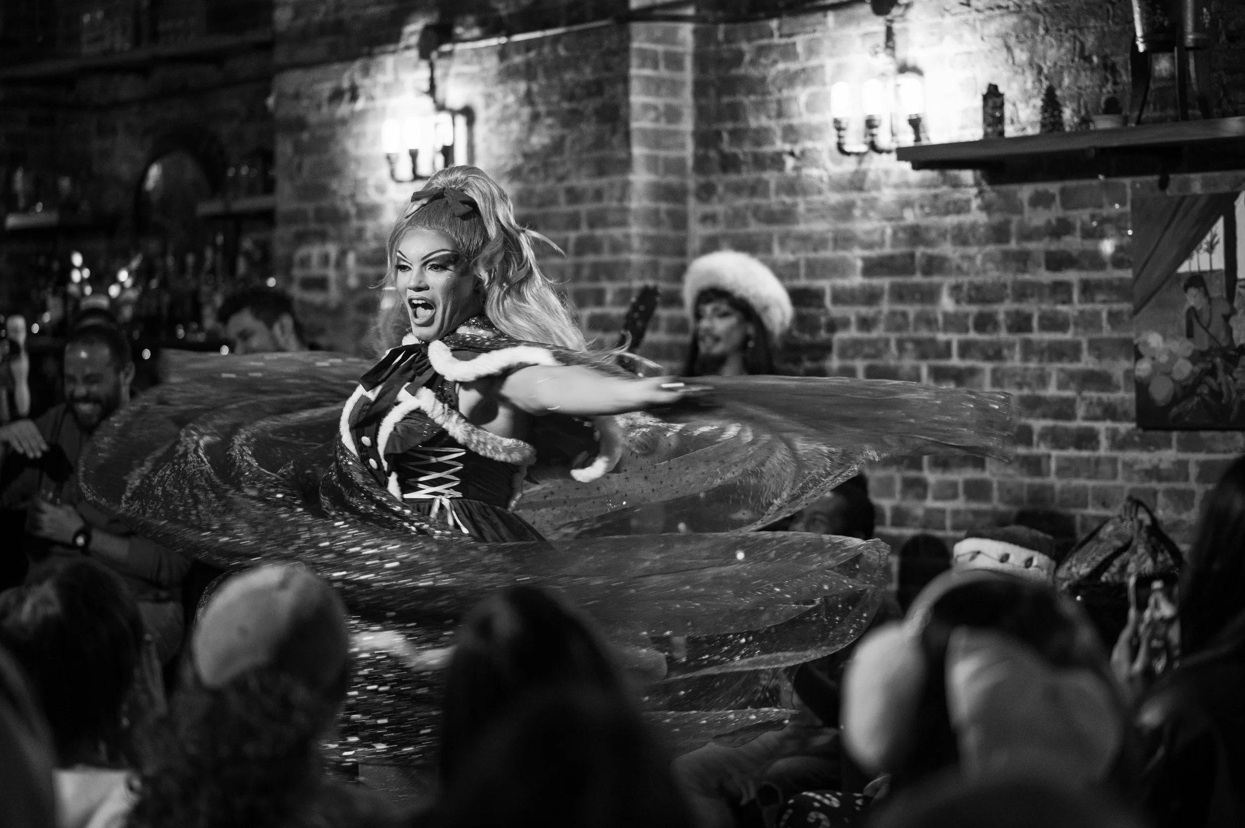 Nick lip syncs to Martina McBride at a Christmas themed show. 