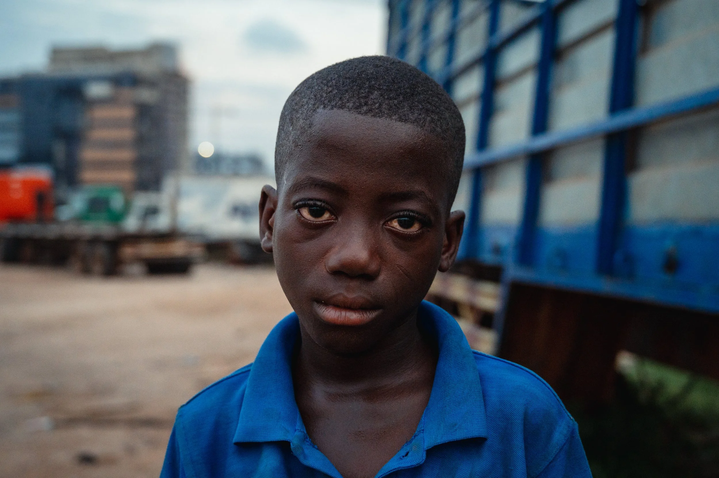 Nicolas, Umbaso's older brother fishes most days to support his family. When the weather is bad, he stays and works with David and David's mother at the stand. 