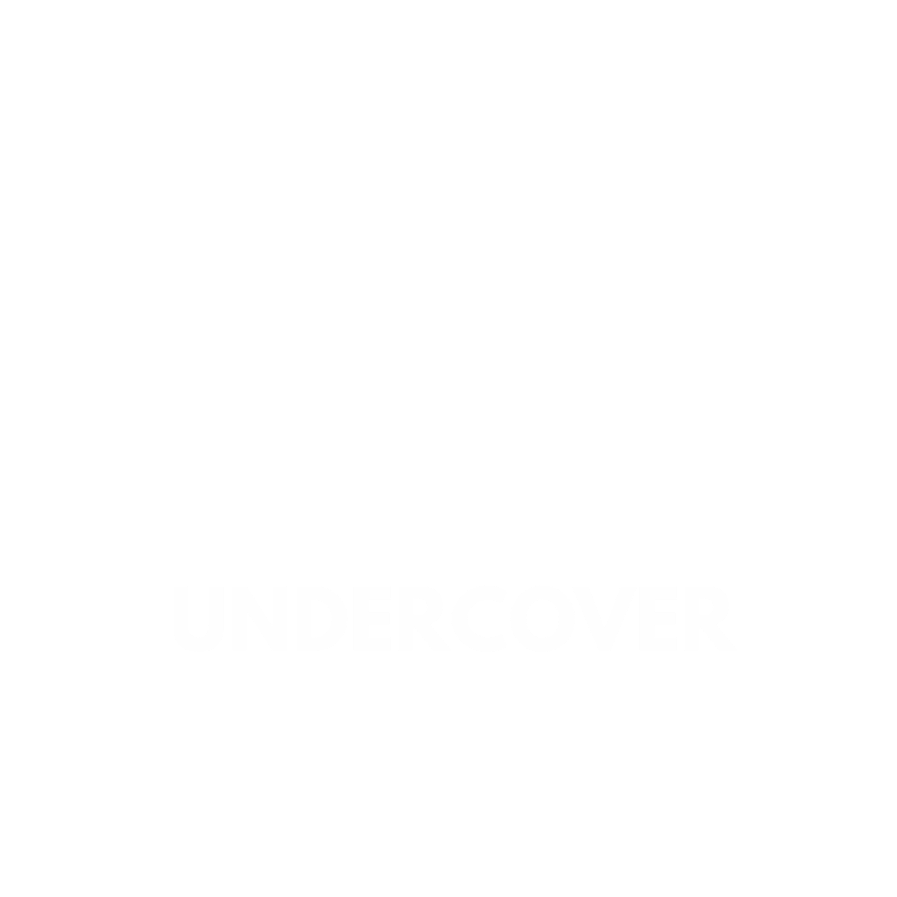 Graphic with a sun partially behind a cloud with rain, and the word "UNDERCOVER" beneath it, on a black background.
