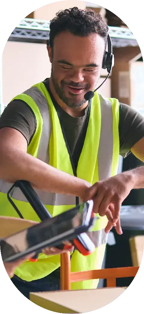 image of man with down syndrome at work in a factory