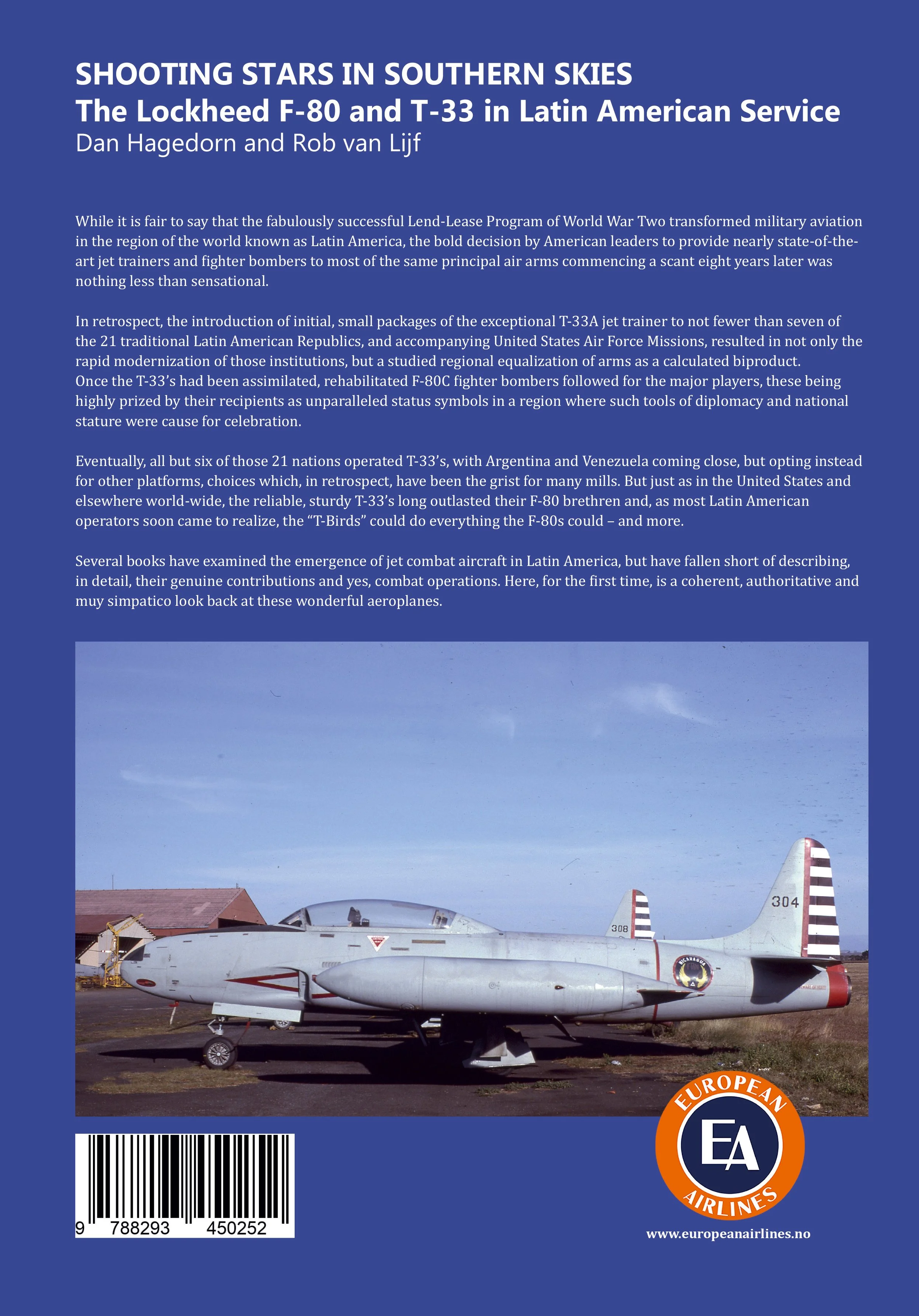 A gray Lockheed F-80 jet aircraft on a runway with buildings in the background.