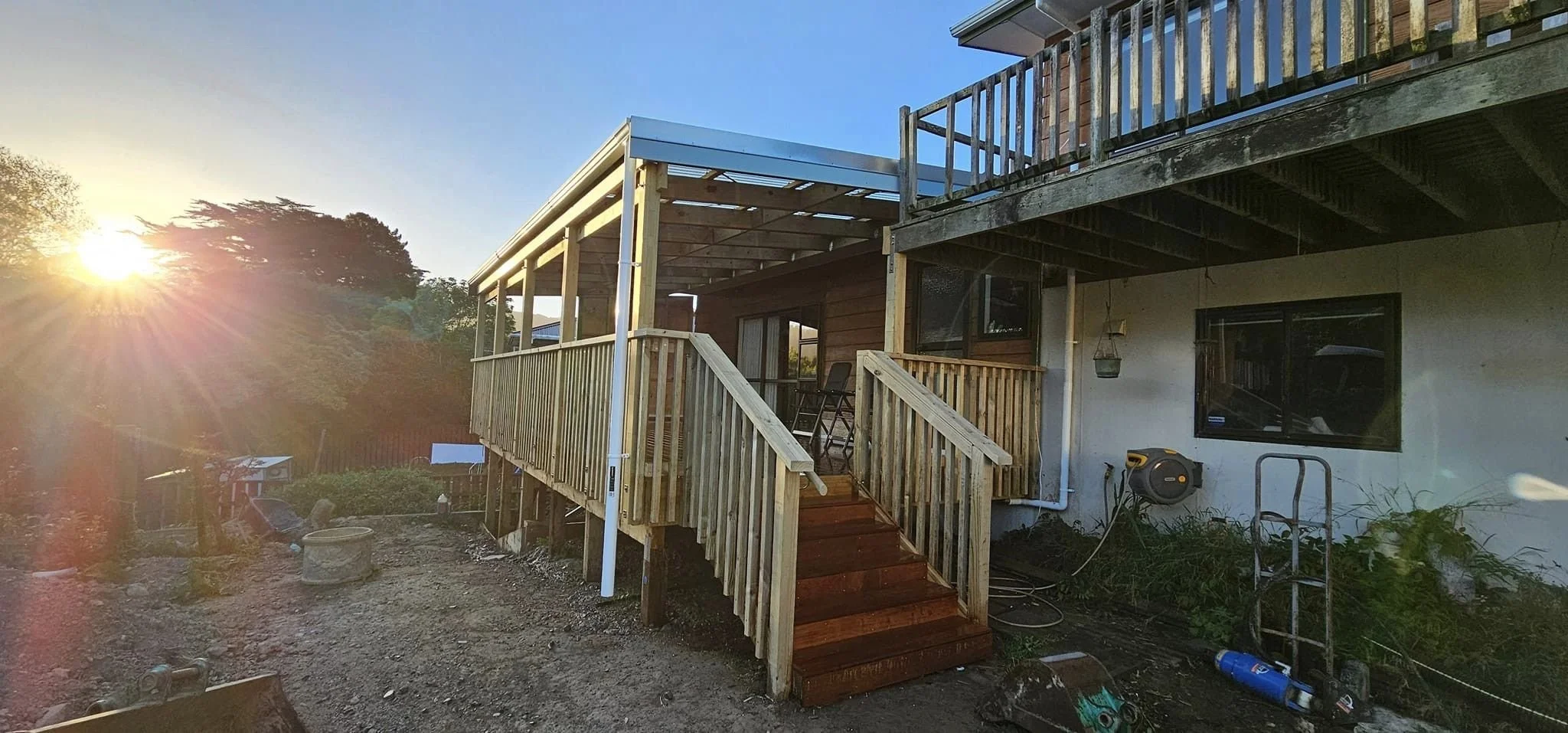 Deck with veranda, balustrade and stairs