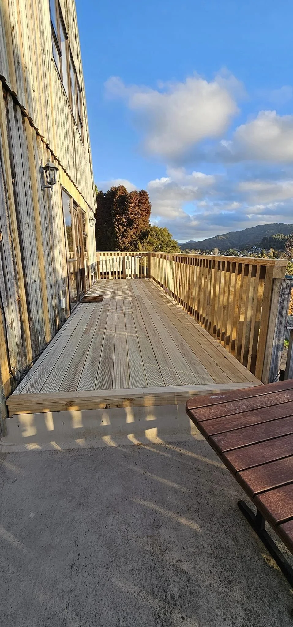 new deck with balustrade and cladding repairs