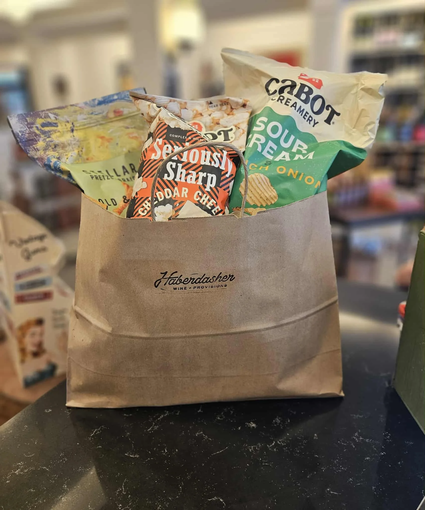 Thursday afternoon chip haul! ❤️ I'm told five bags of Stellar Pretzels, four bags of Cabot Chips, and a bag of Cabot Popcorn should be enough to satiate a household for at least a week. 😋
We got to use our largest paper bag for this snack-dash!