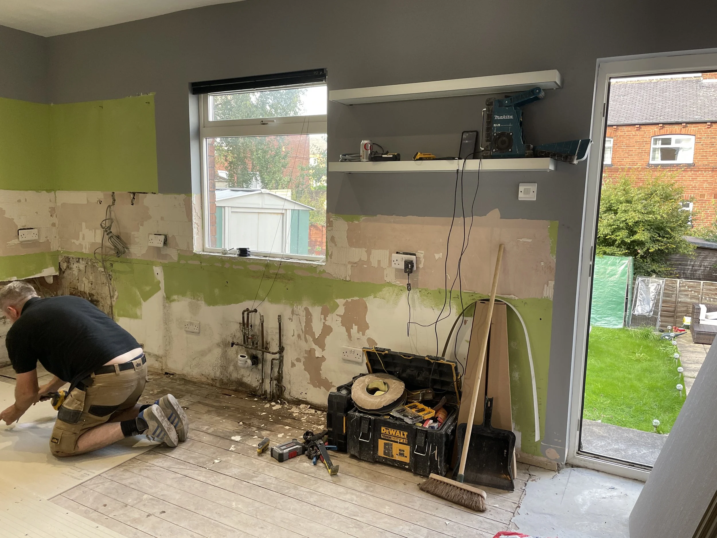 Right hand view of cleared out kitchen