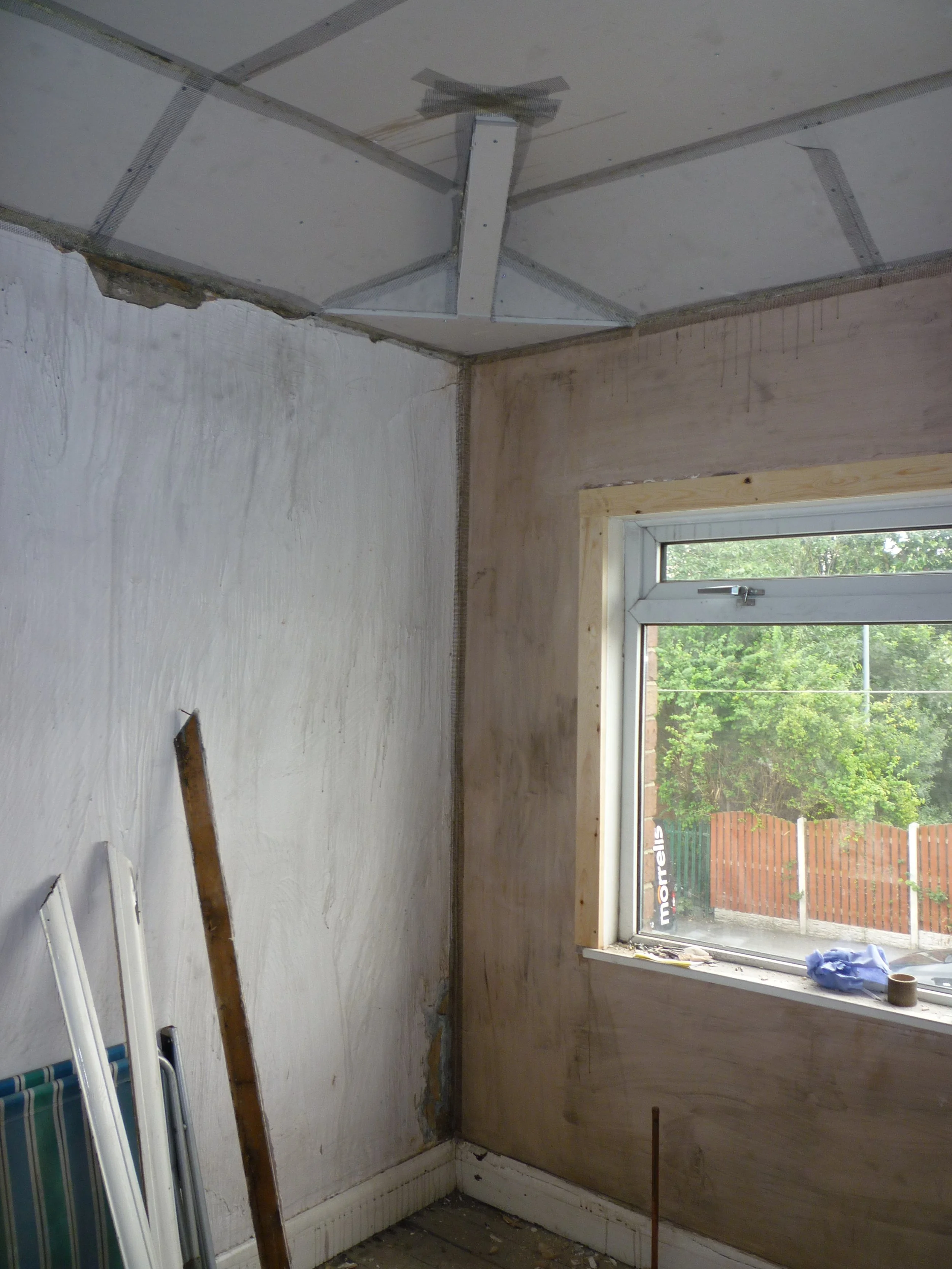 Plasterboard of ceiling ready for plastering