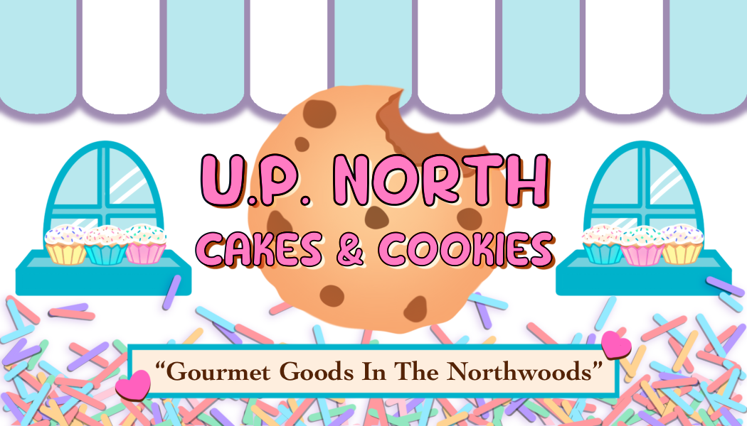 A colorful bakery sign with a large chocolate chip cookie in the center, with pastel-colored cupcakes on blue display stands on either side, sprinkles scattered at the bottom, and the text 'U.P. NORTH Cakes & Cookies' in pink and purple lettering, with the tagline 'Gourmet Goods In The Northwoods' at the bottom.