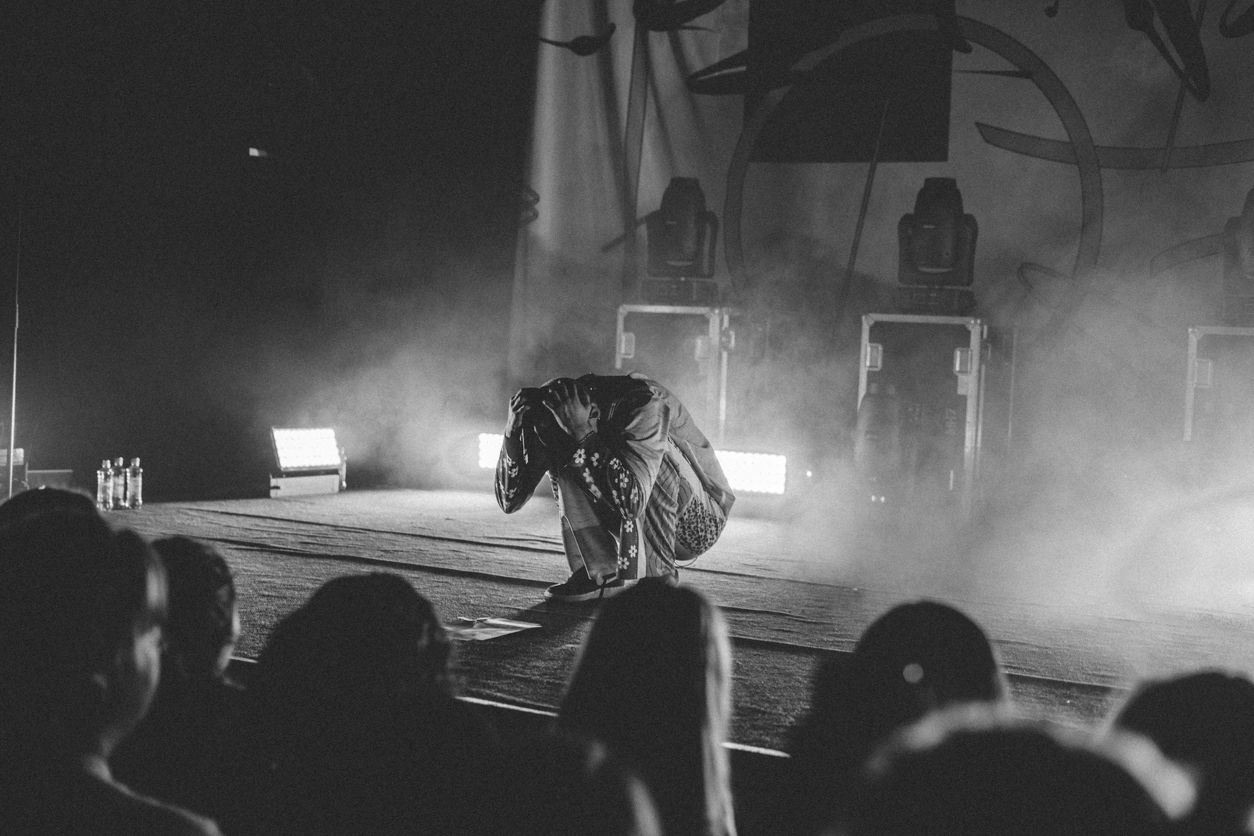 Person fearful on stage