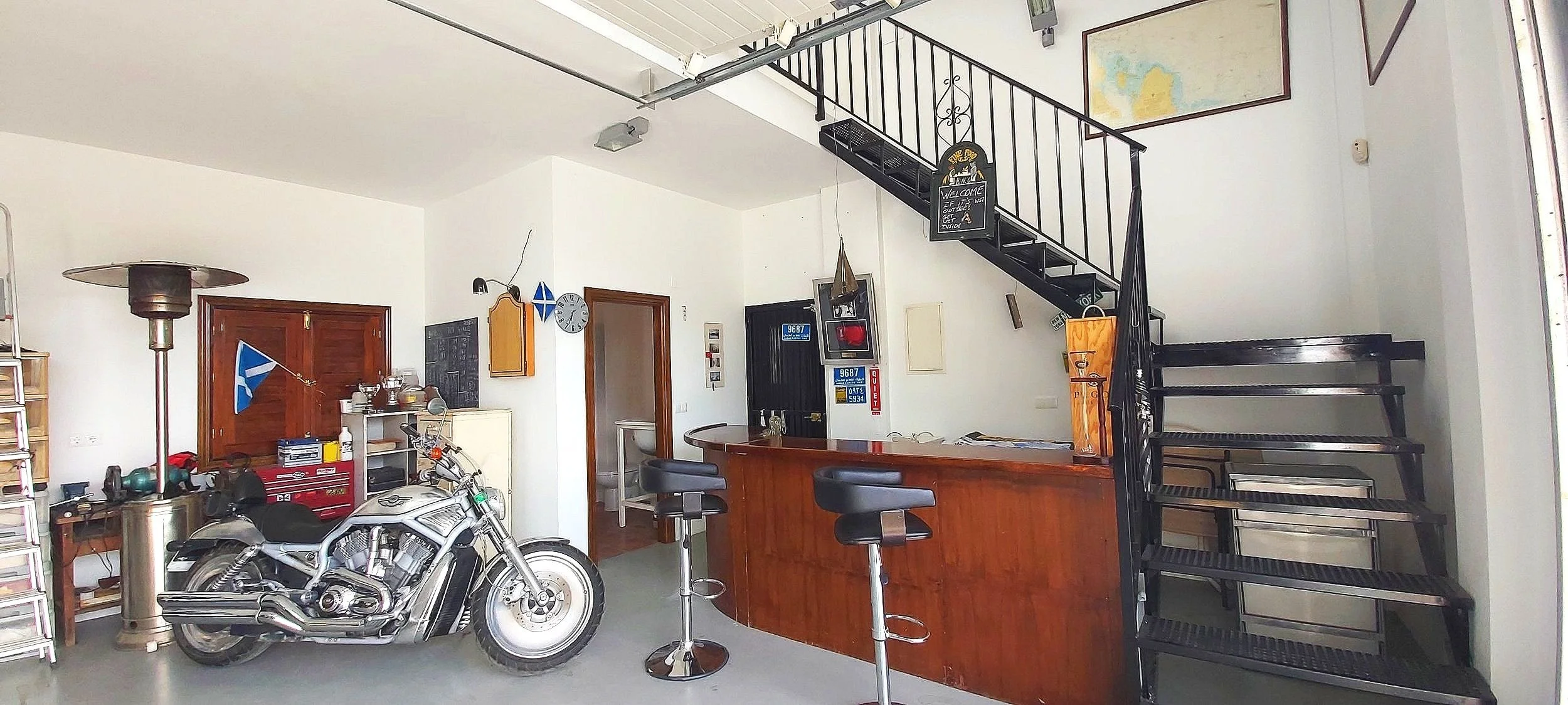 Garage with Toilet and Bar and Harley .jpg