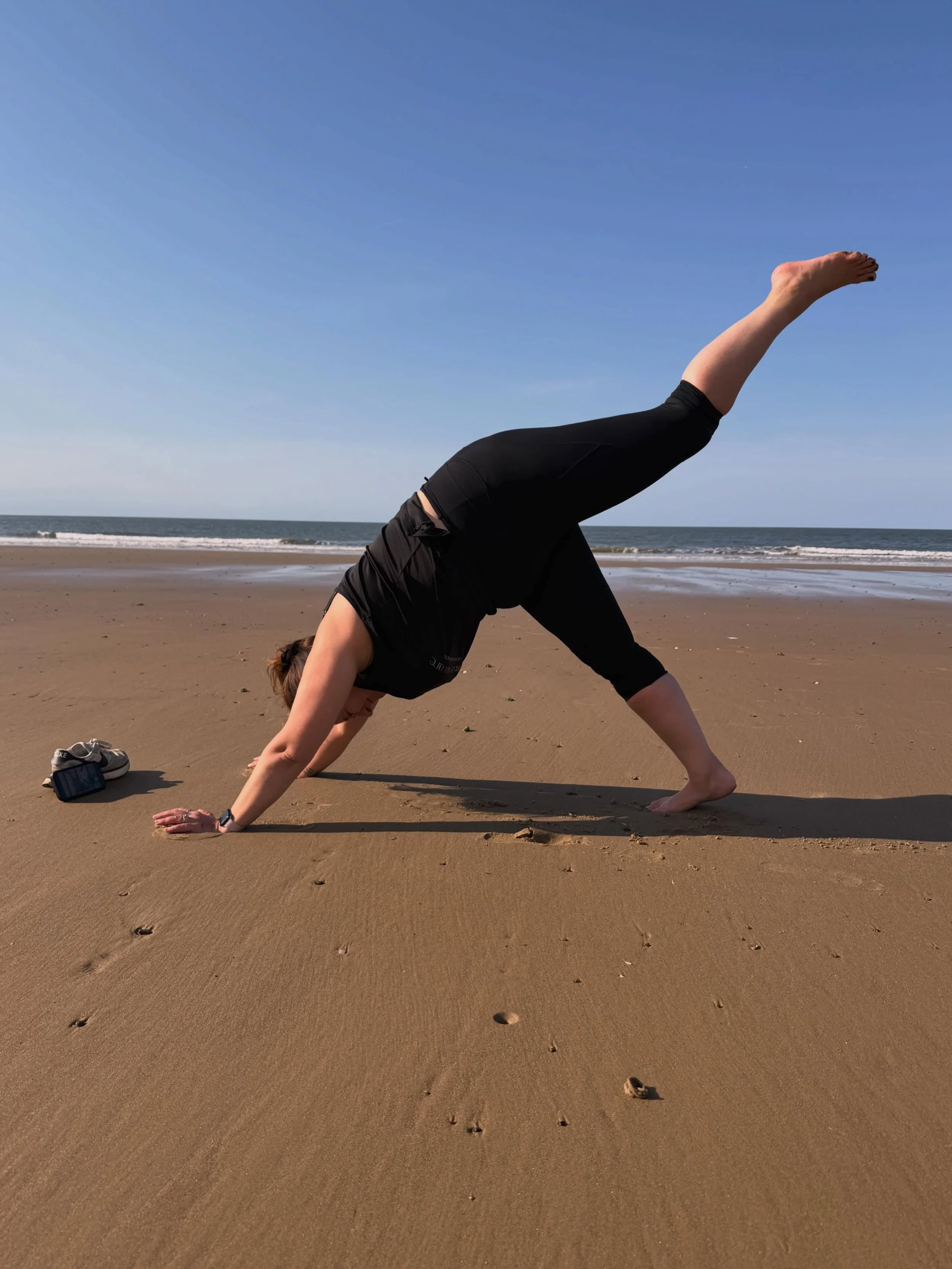 This great weather reminds me of my trip to the beach a couple of weeks ago and the freedom I felt next to the sea with miles of ocean in front and sand around as I took my yoga practice to the sand. No mat required and leggings pulled up post paddle