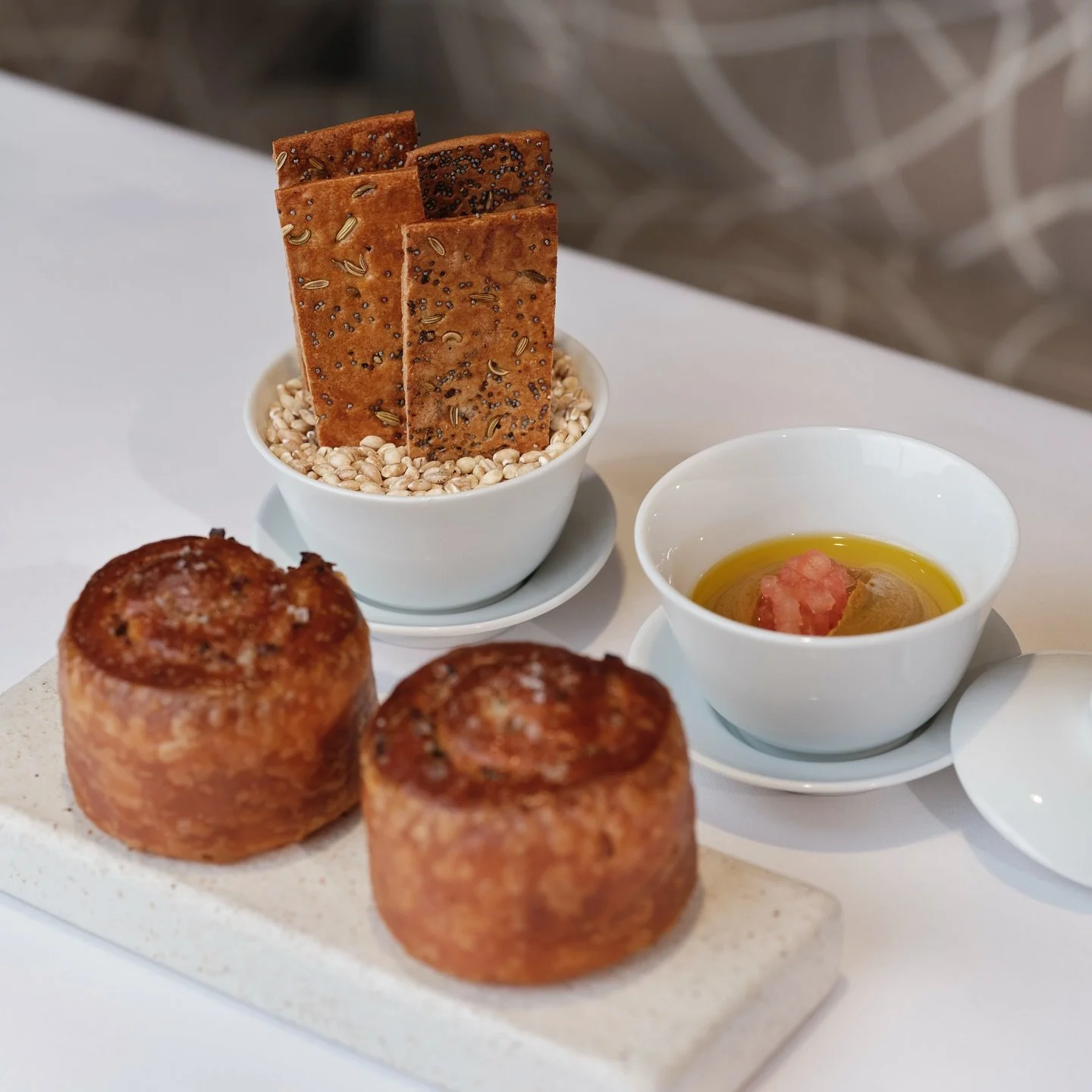 A bread course worth lingering over&hellip; ✨

🧅 Laminated Roscoff Onion Brioche
⭐️ Mixed-Seed Lavosh with &ldquo;Imam Bayildi&rdquo; 
🌱 Seaweed Sourdough served with Bordier Unsalted &amp; Seaweed Butter for the perfect finish 💜

#bohemiajersey #