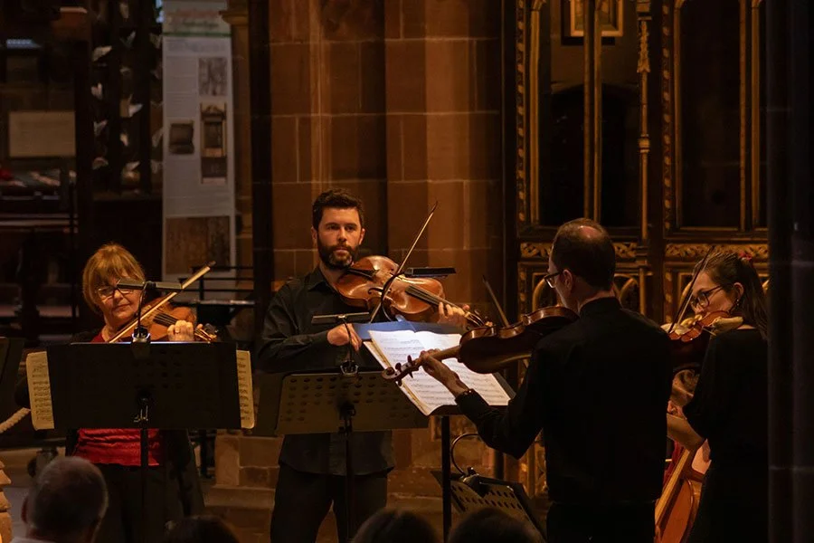 Musicians playing in cathedral