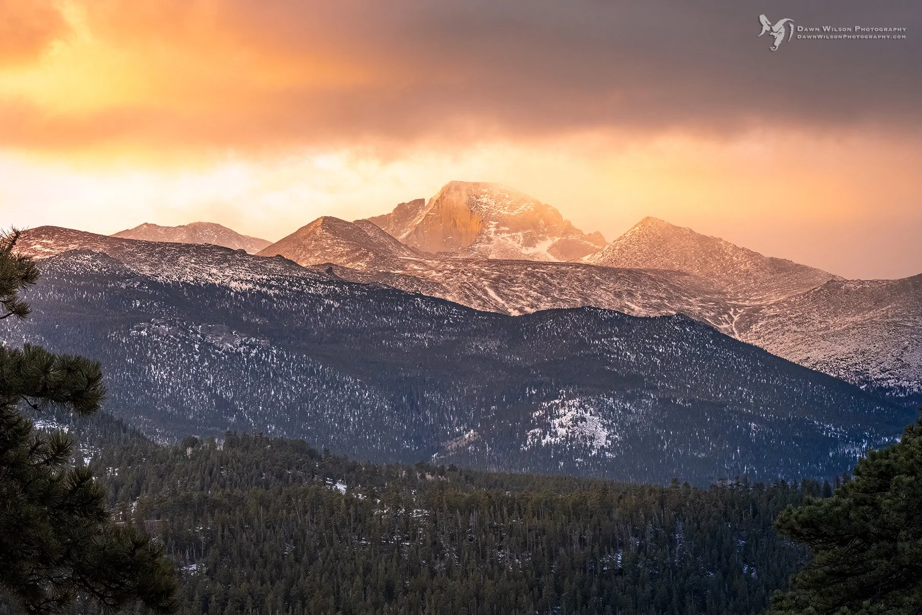 Longs Peak at sunrise in Rocky Mountain National Park, Colorado. Photographed with a Nikon 70-200mm lens at 102mm.