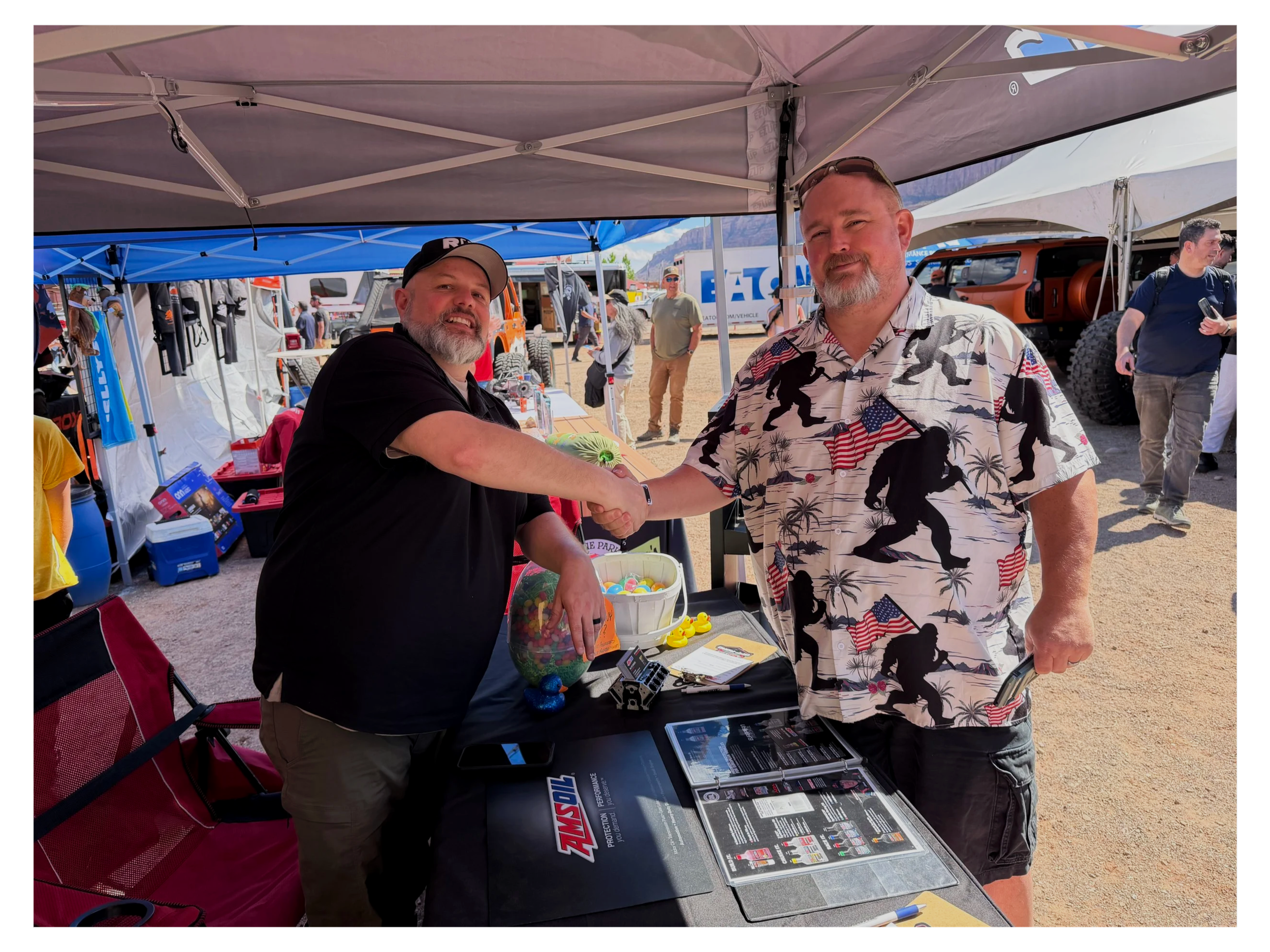 Josh Friesen of Mill City Synthetics greeting a customer at Easter Jeep Safari in Moab Utah