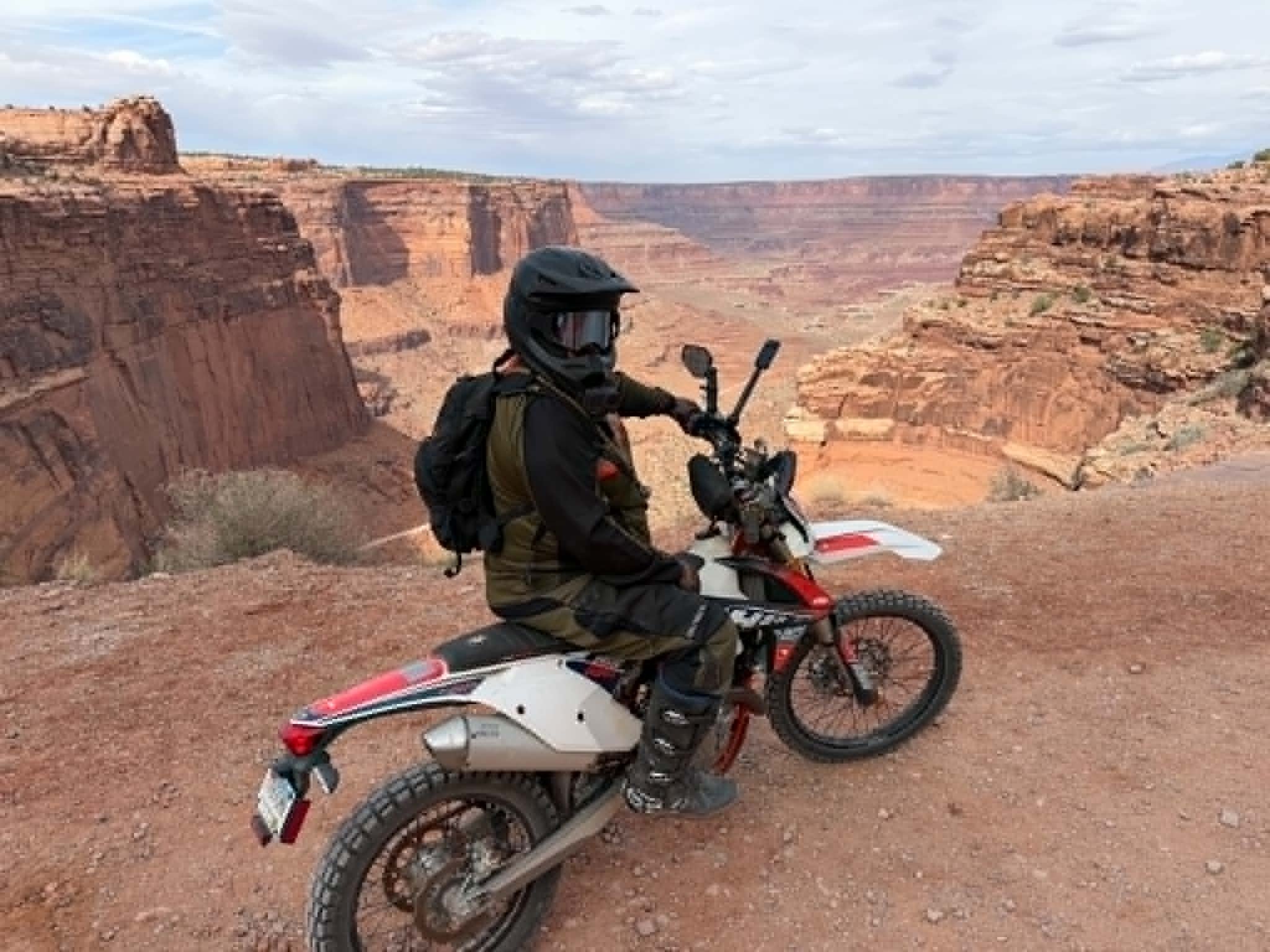 KTM 450 EXC-F dirt bike on a rocky overlook in Moab Utah running AMSOIL synthetic oil