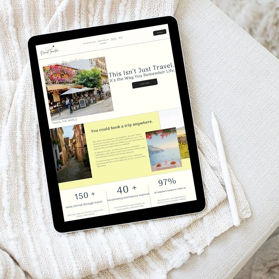 A tablet displaying a travel website on a white textured cloth with a white stylus pen beside it.