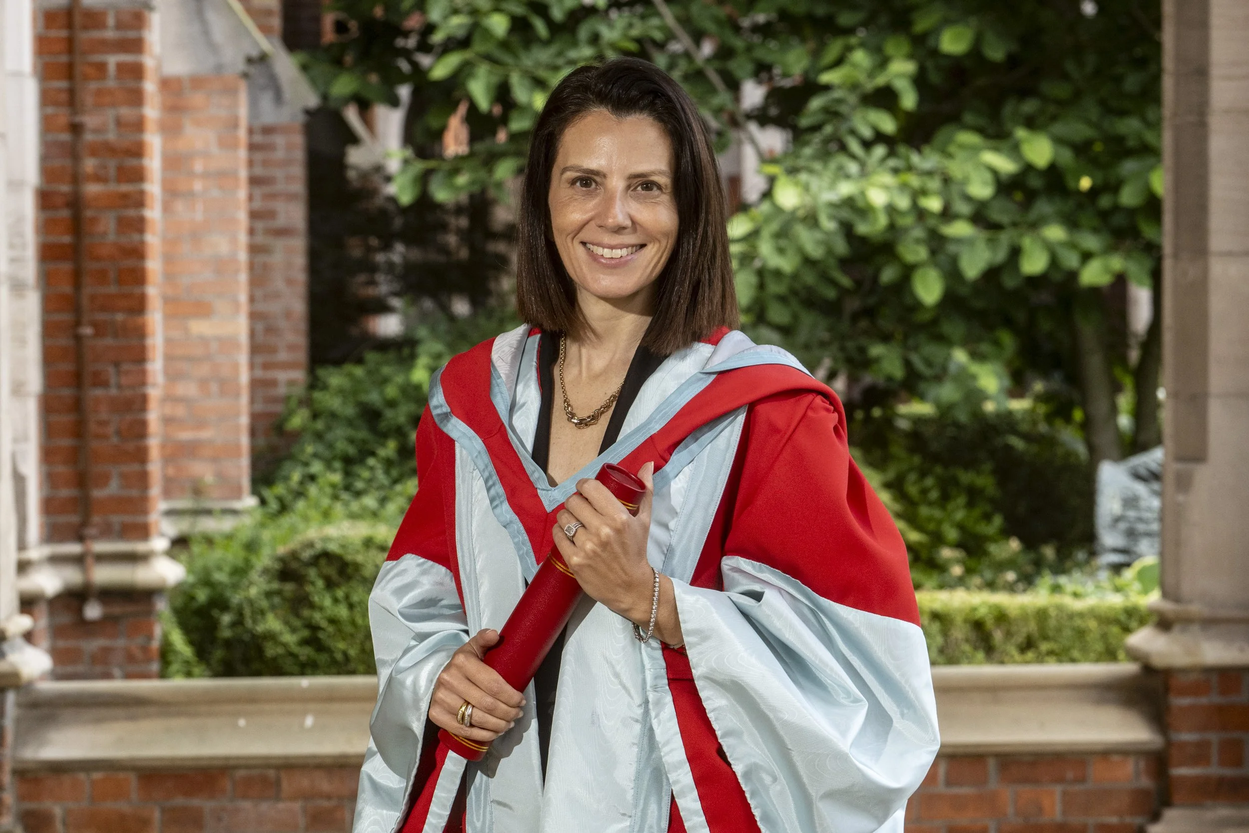 Keren Yarhi-Milo receiving her honorary degree from Queens University Belfast