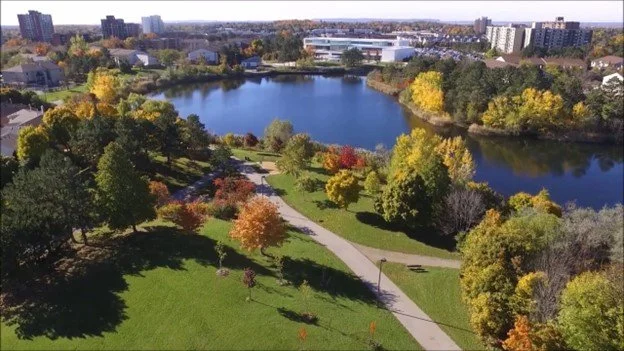 Paved path at Lake Aquitaine Trail in Meadowvale, perfect for seniors walking