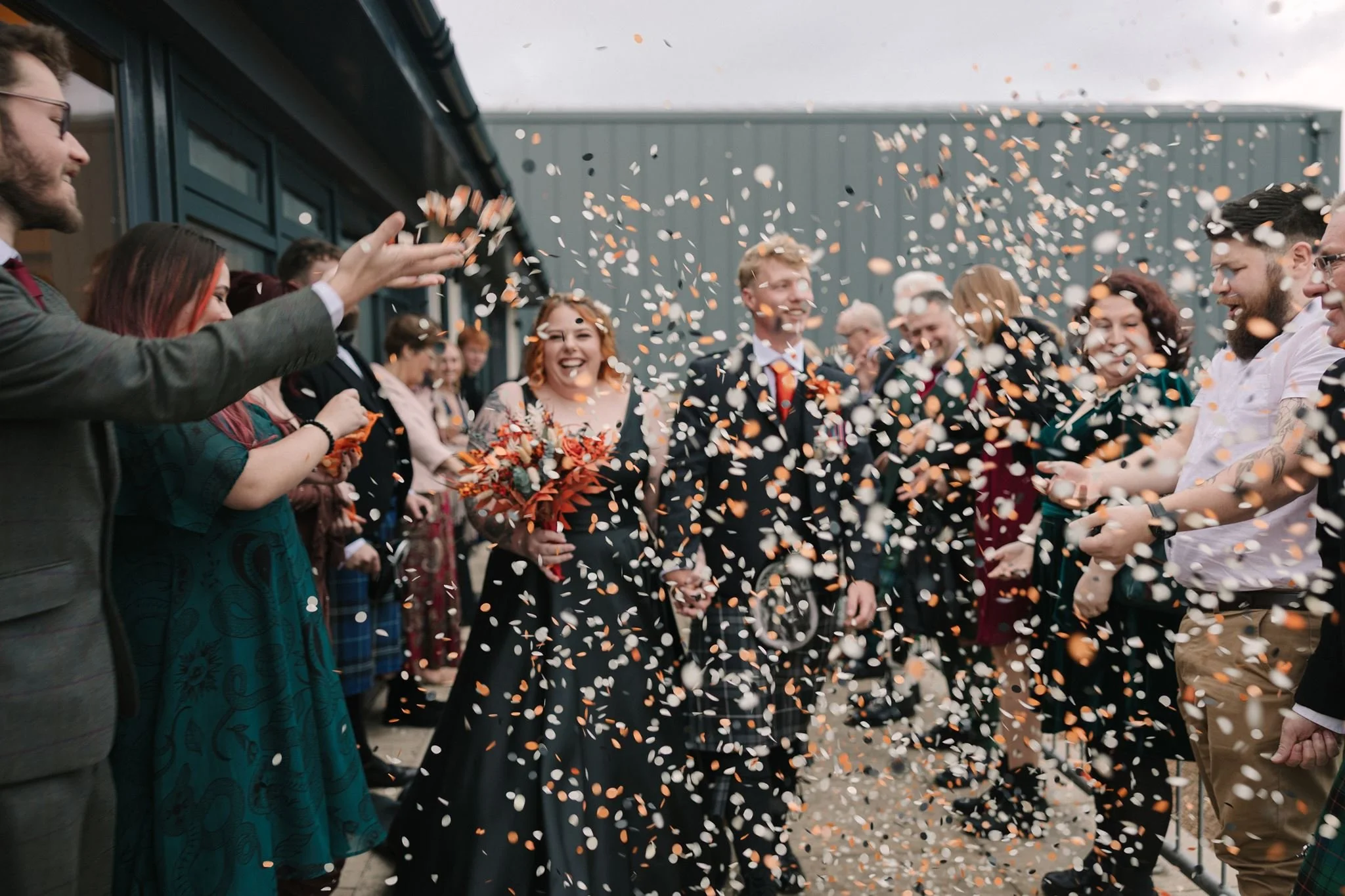 confetti throw at Halloween themed wedding at harbour barn