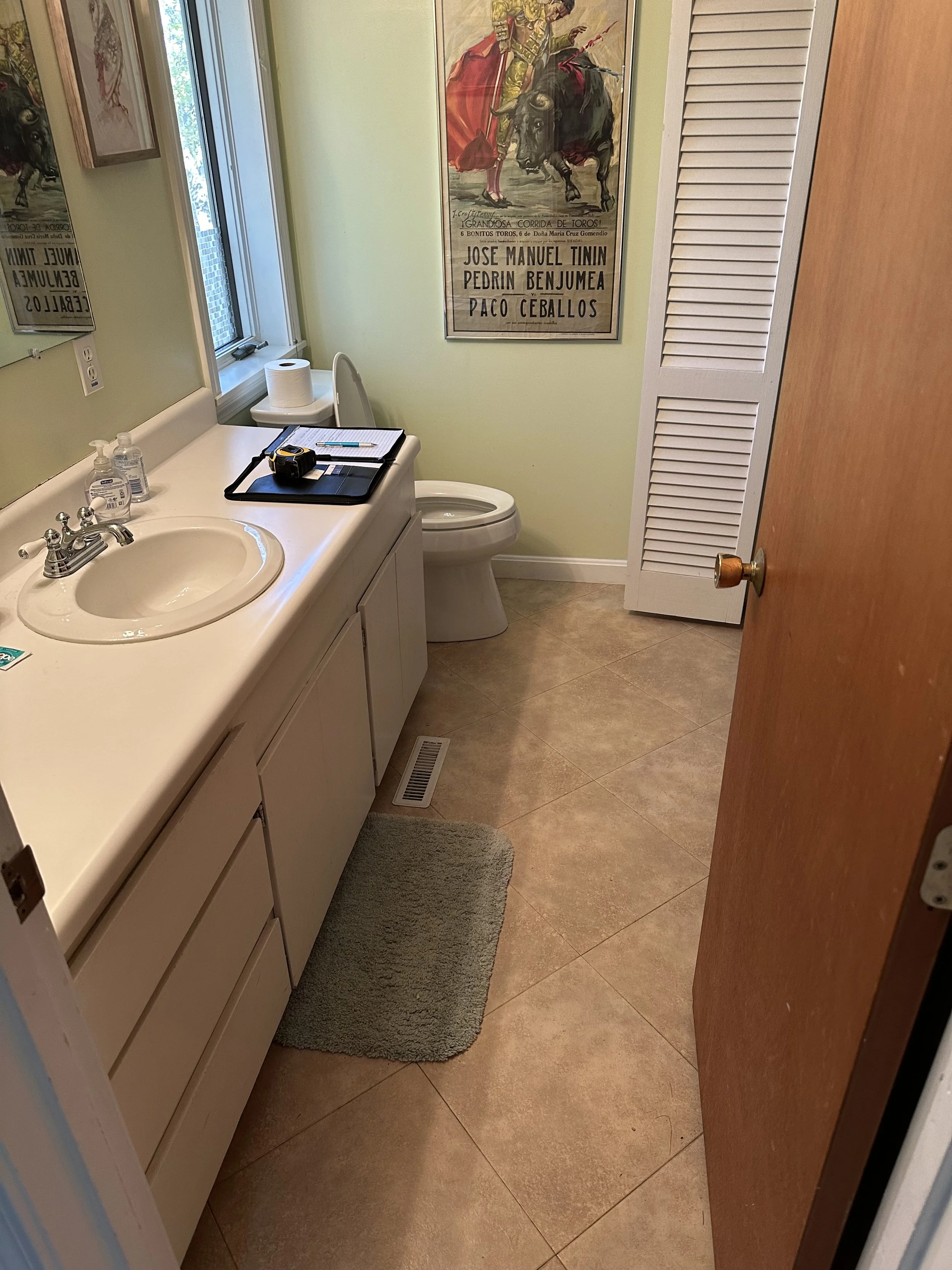 Tired outdated bathroom