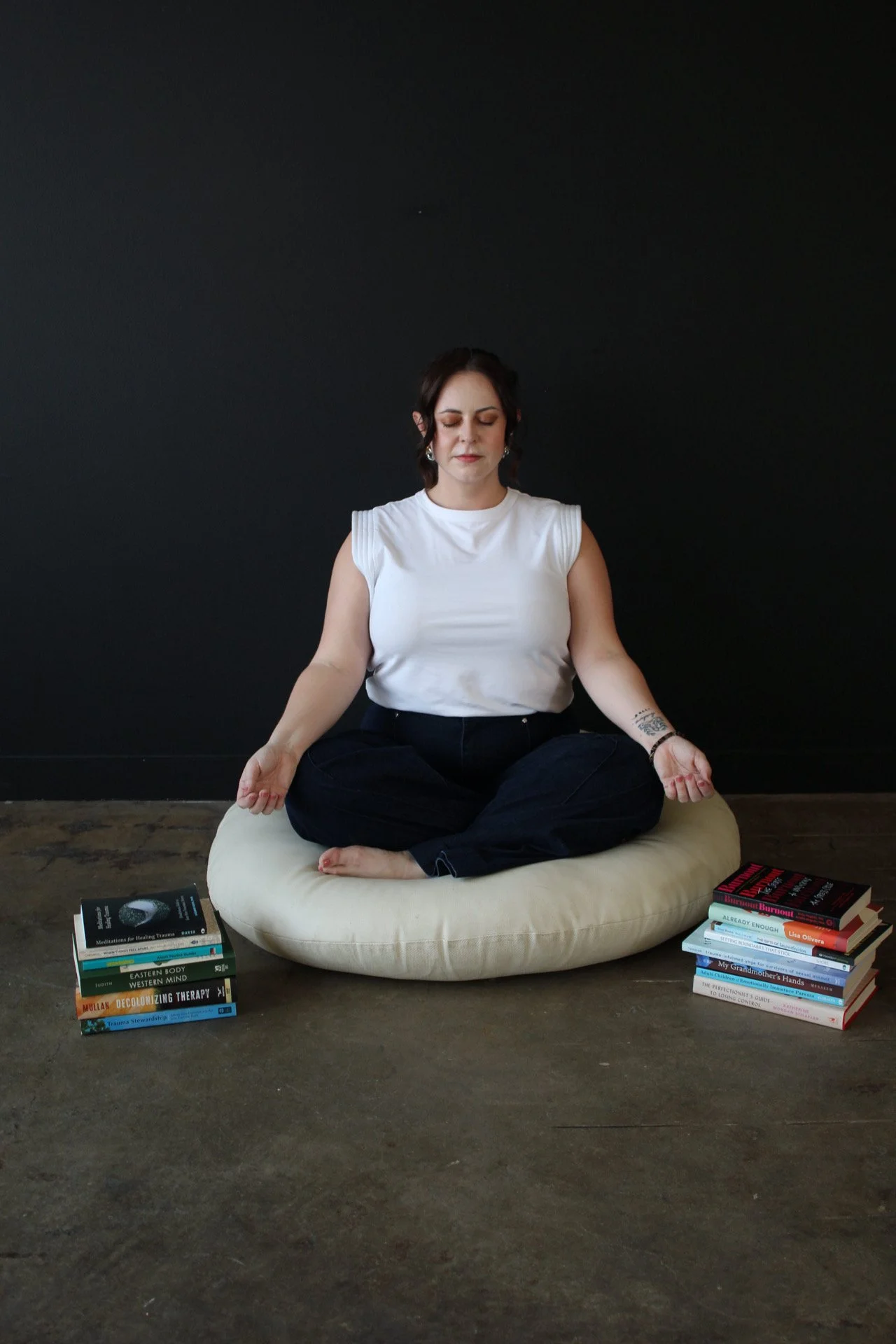 A therapist practicing a gentle somatic exercise for exhaustion and nervous system regulation as part of burnout recovery.