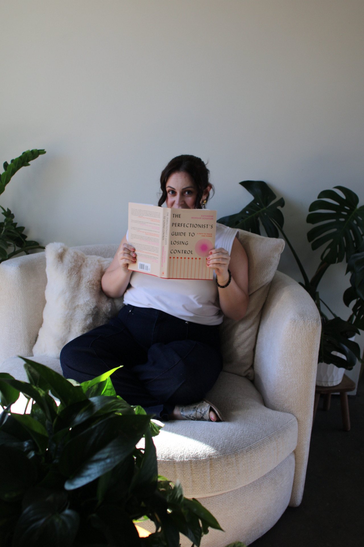 High achieving woman struggling with boundaries, people pleasing, and emotional responsibility
