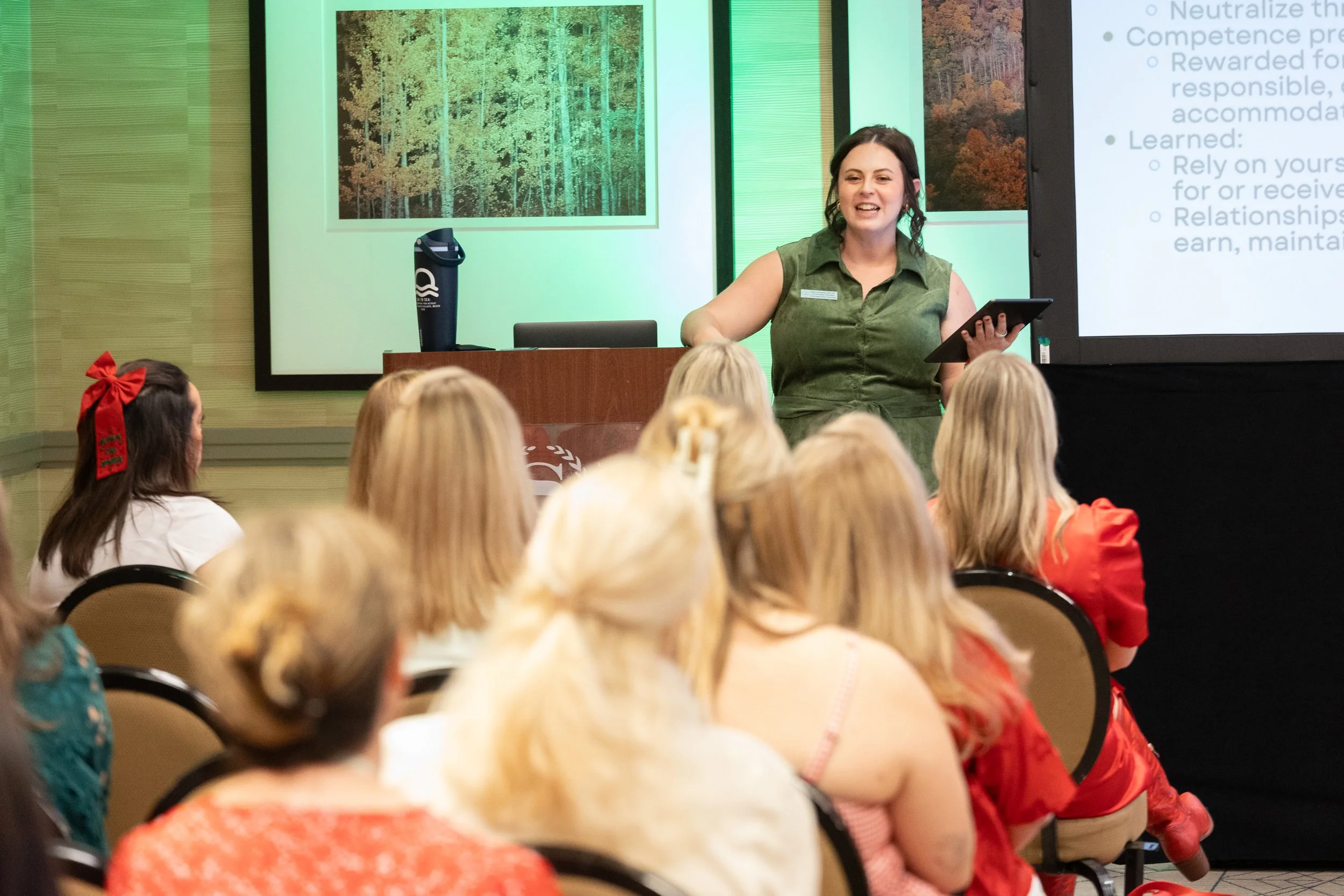 Aubrey Richardson LPC presenting a workshop on burnout and emotional labor for high-achieving women.