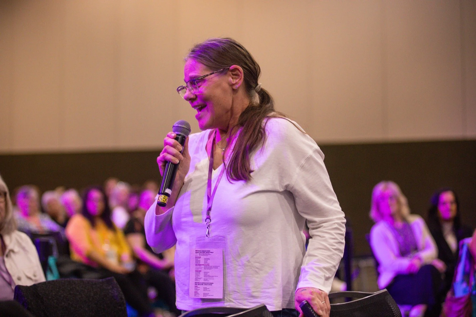 Friends laughing together at a past MORE Conference