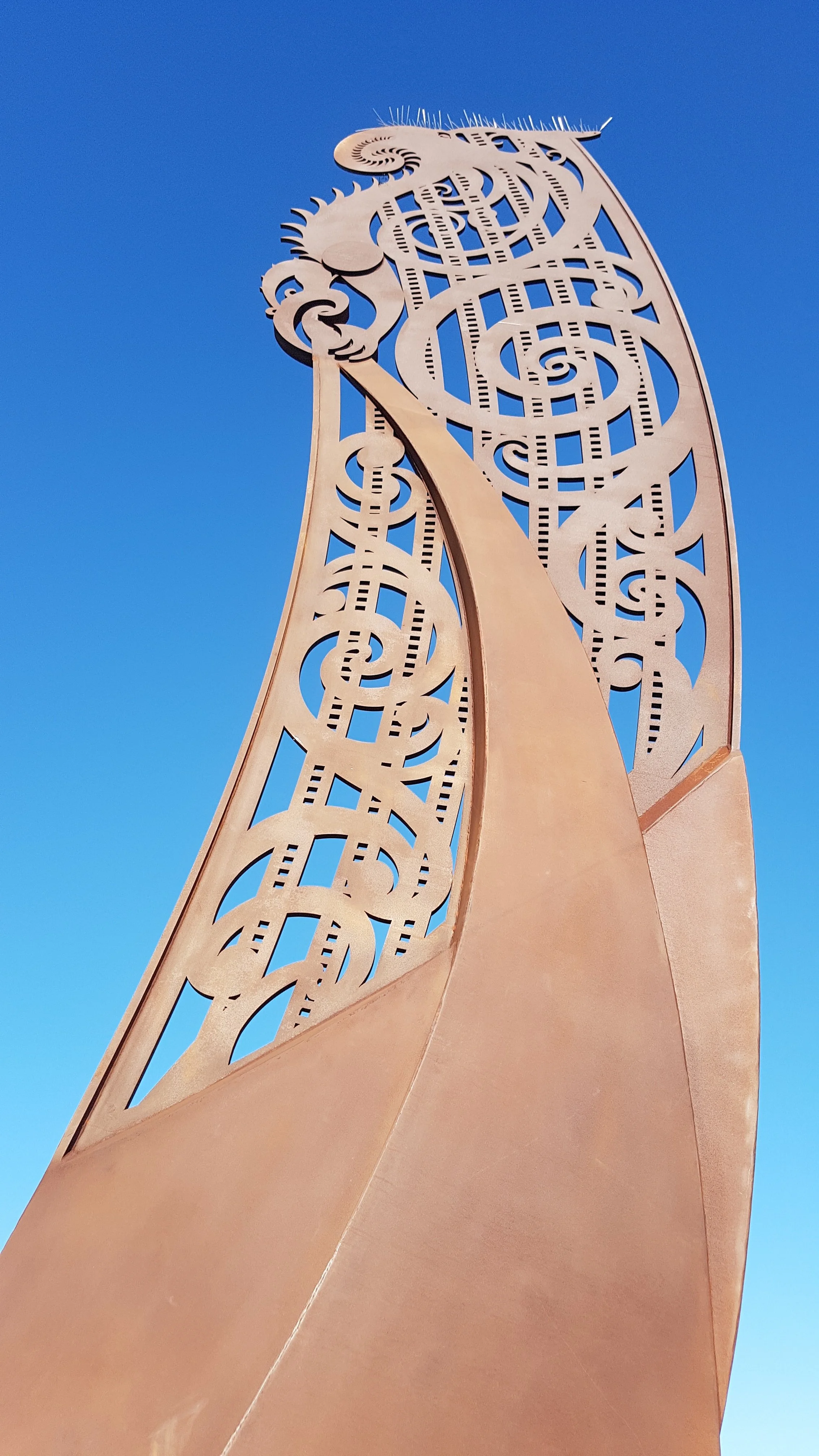 Cortin steel sculpture of Taupara (Waka prow) designed by artist Maia Heggland and refined detailing for steel-cutting by architectural designer Keni-Duke Hetet