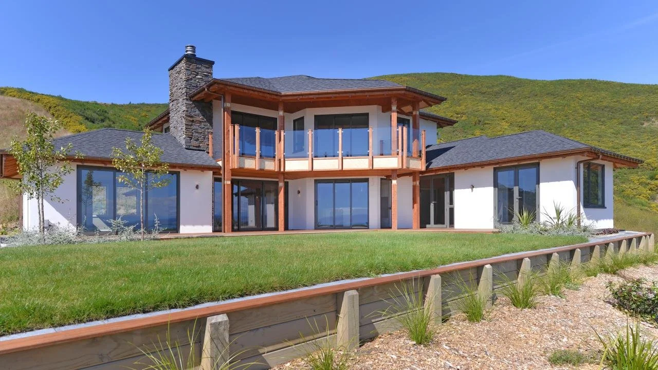 Northern aspect of new home in Balinese style on Atawhai hills Nelson