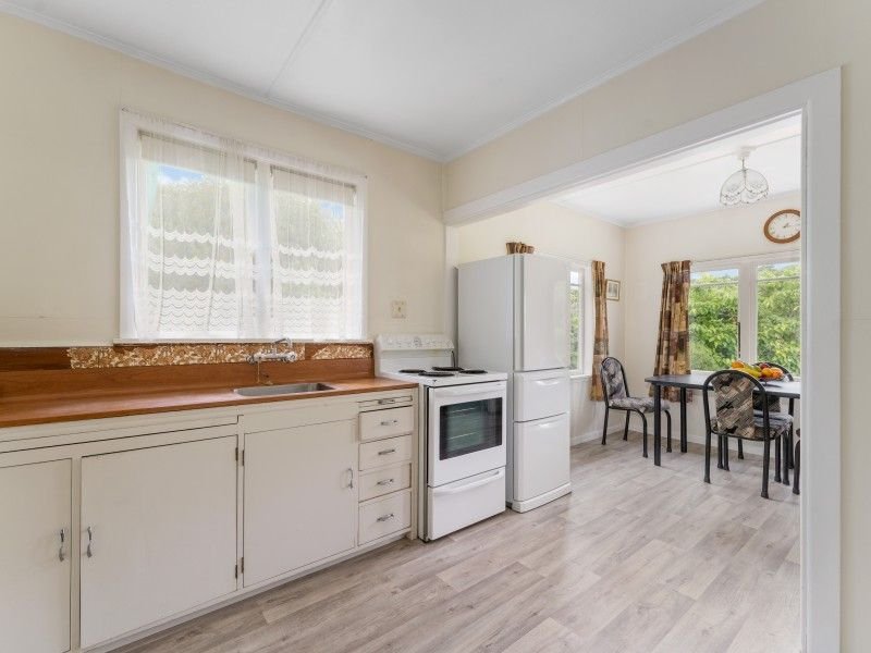 Kitchen and dining area before