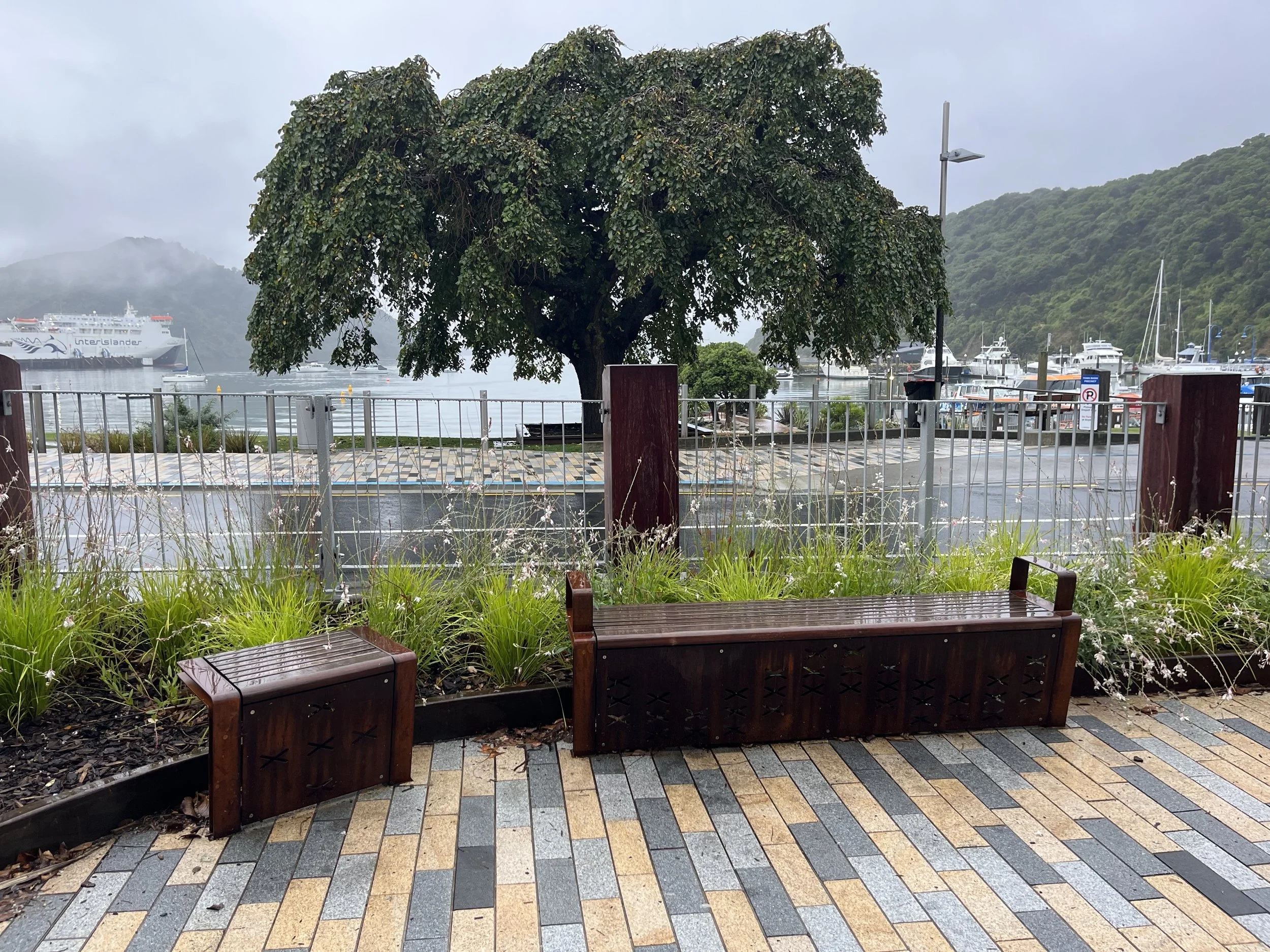 Whetu patterning on bench seats looking out to water at Picton waterfront by Keni-Duke Hetet Architectural Design