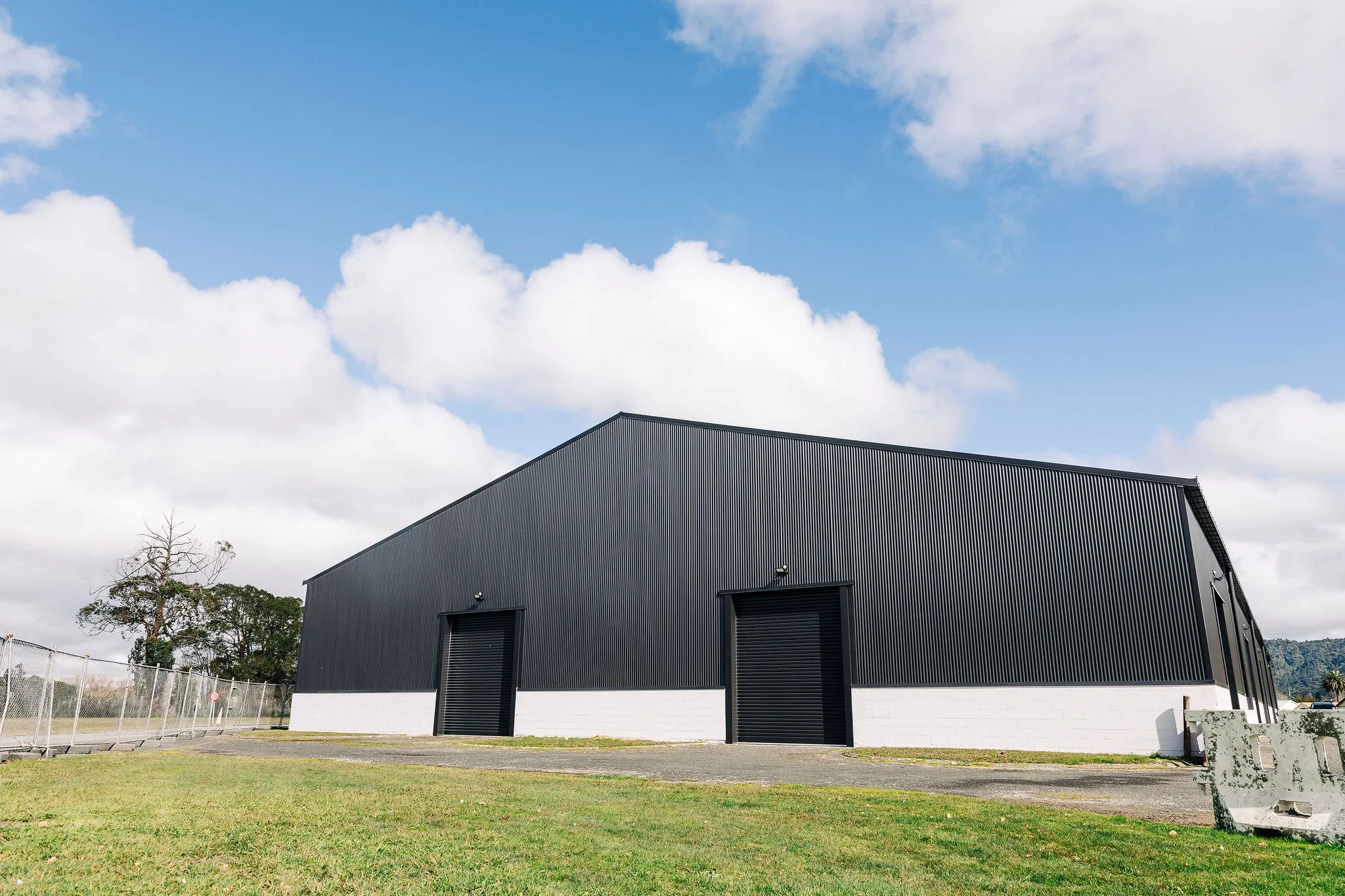 End facade of upgraded sports hangar in Hopuhopu showing new cladding