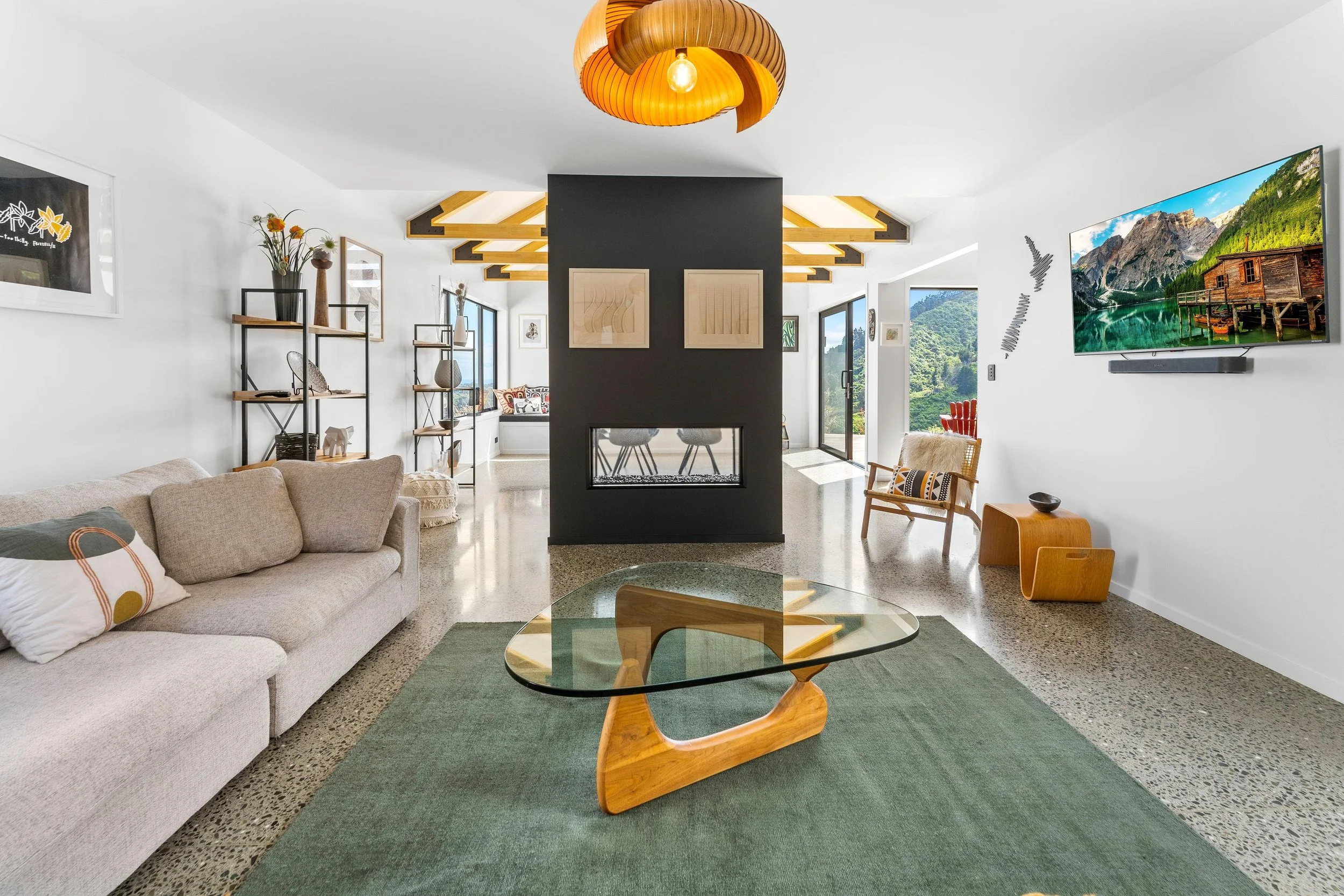 Lounge area with middle feature fire, new home, Nelson