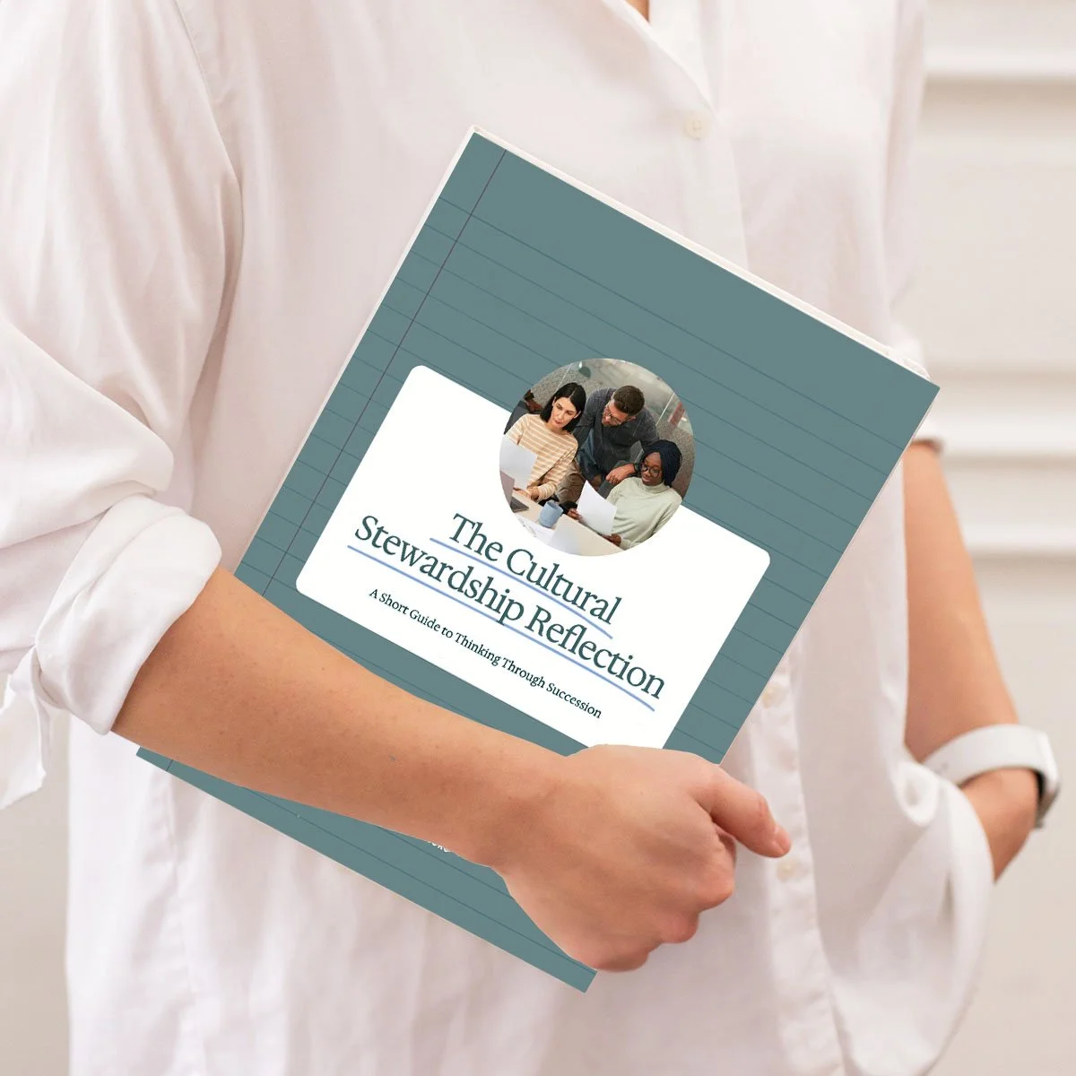 nonprofit leader holding cultural stewardship reflection guide document tucked under her arm