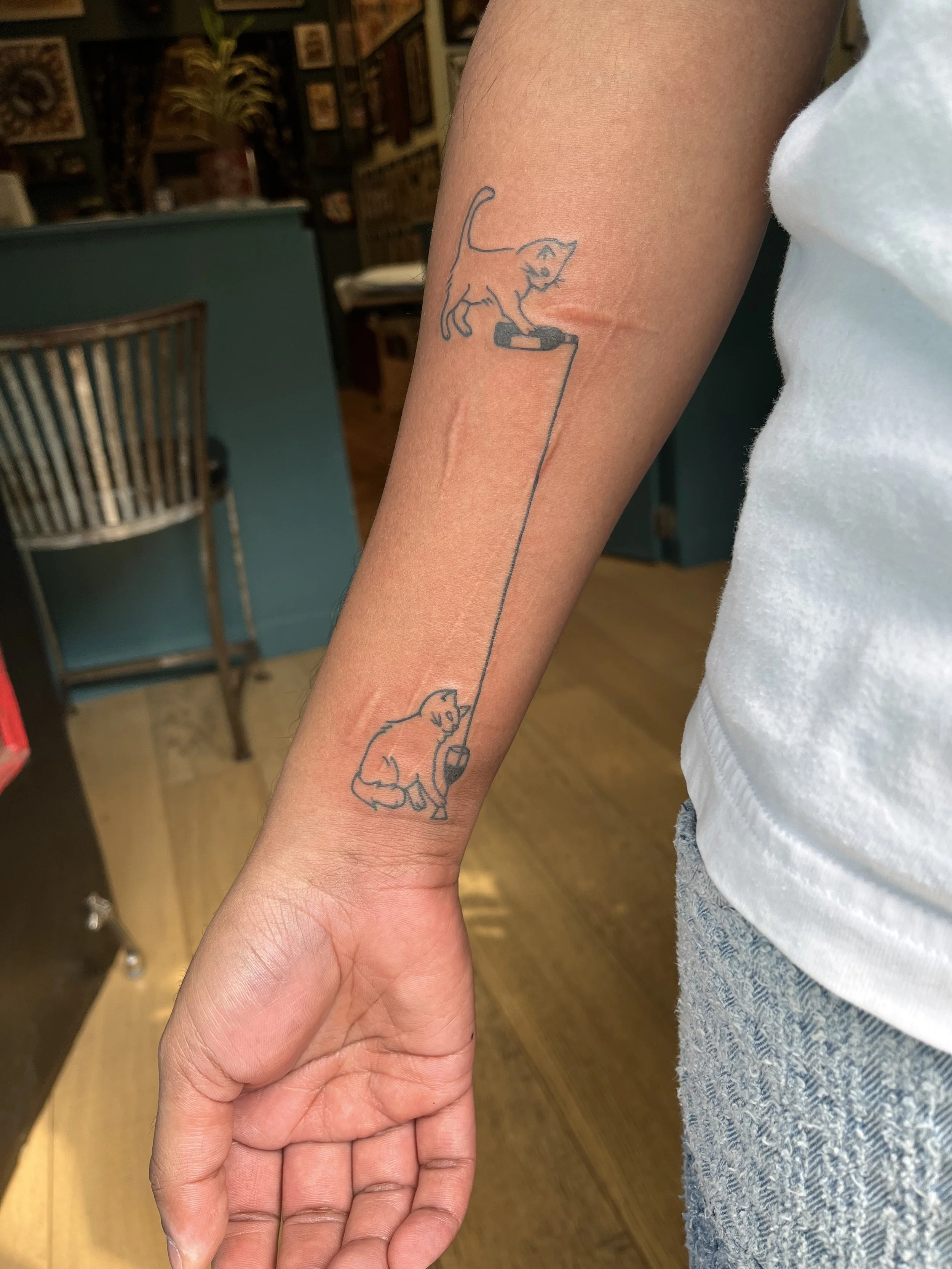 Julius-Forte-Tattoo-Portfolio-Brooklyn-Two-Cats-On-A-Leash-Forearm-Tattoo.jpg