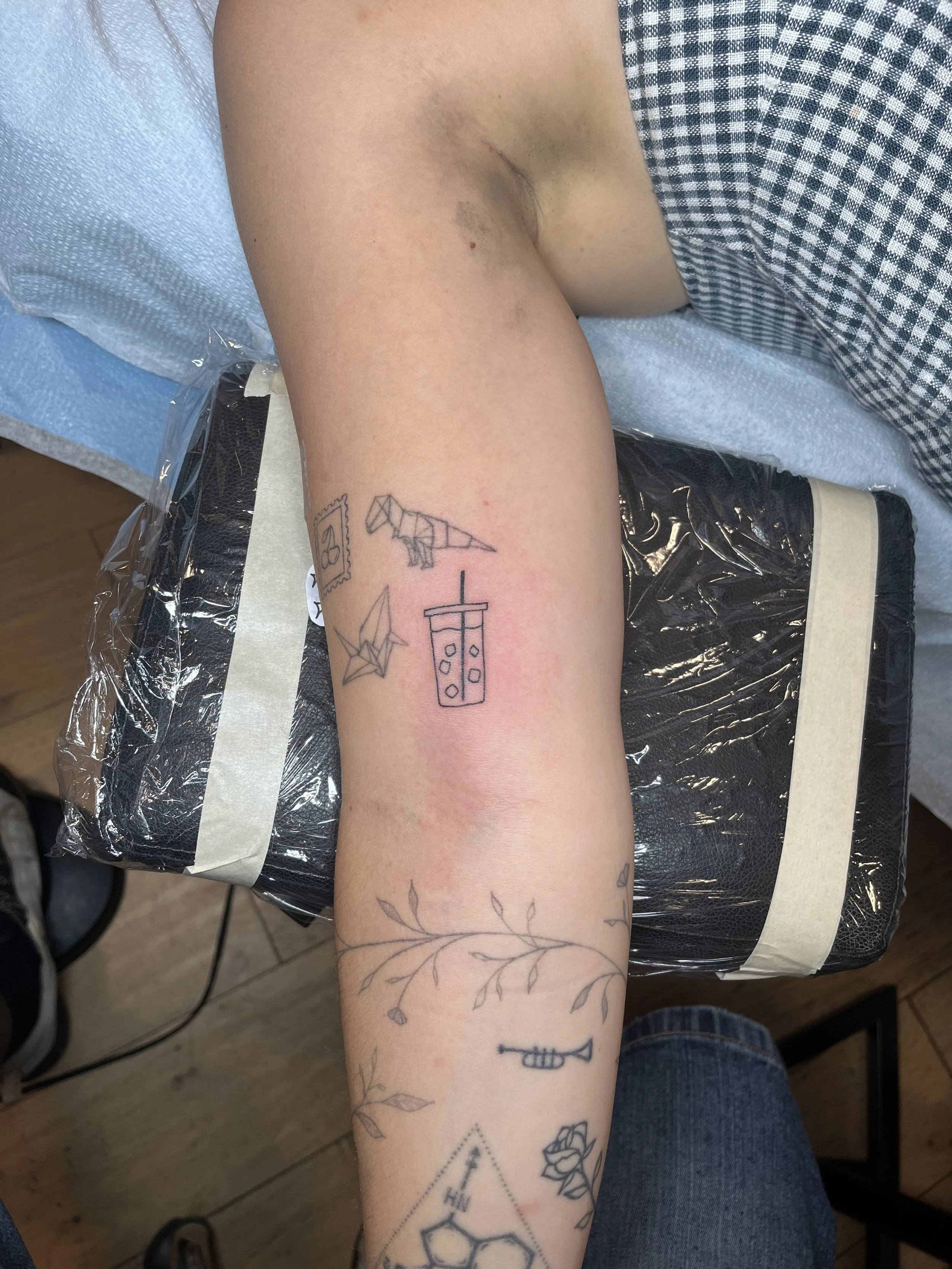 Julius-Forte-Tattoo-Portfolio-Brooklyn-Dinosaur-Paper-Airplane-Boba-Tea-Forearm-Tattoo.jpg